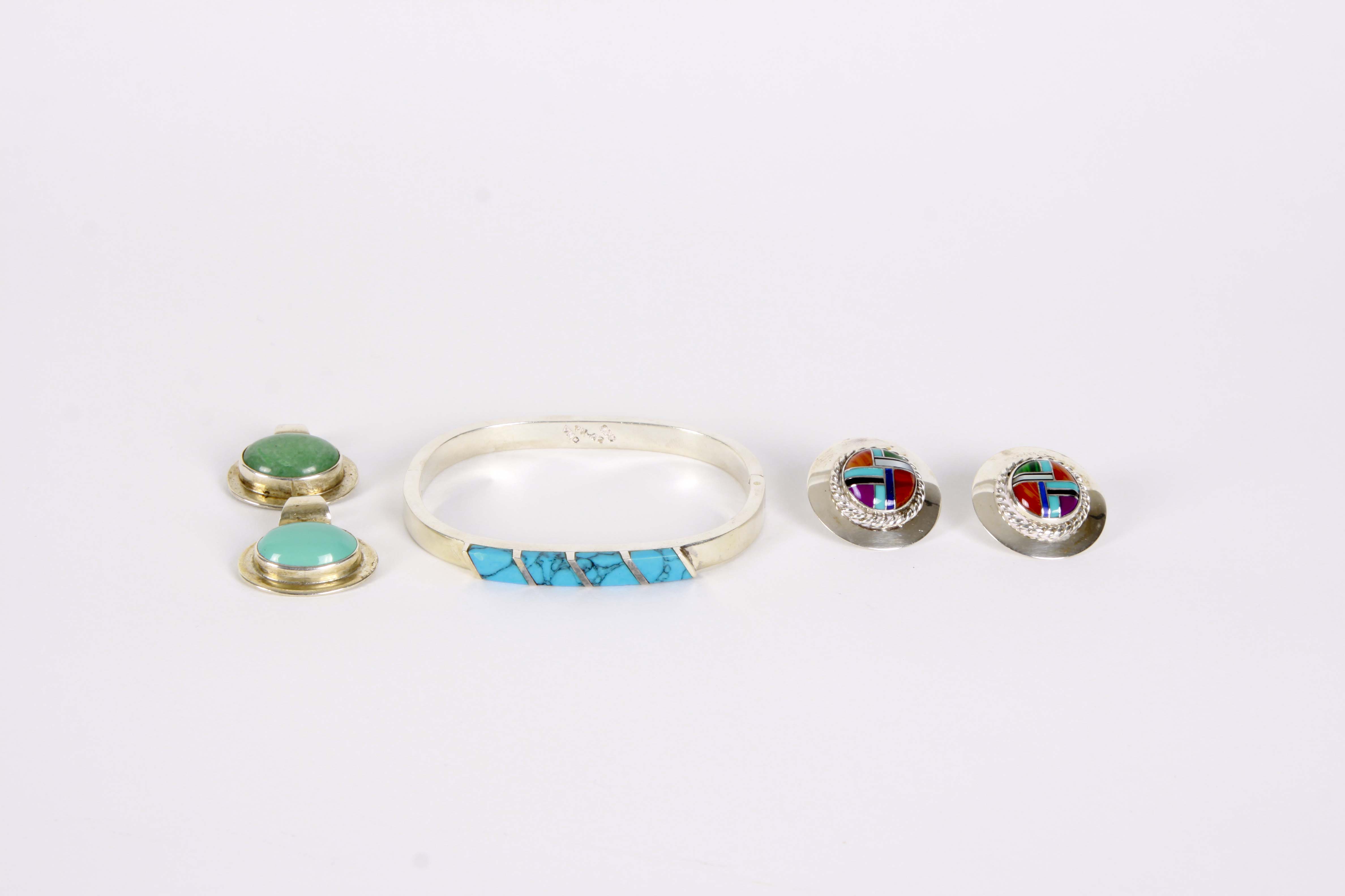 Silver Bracelet, Earrings, and Pendants