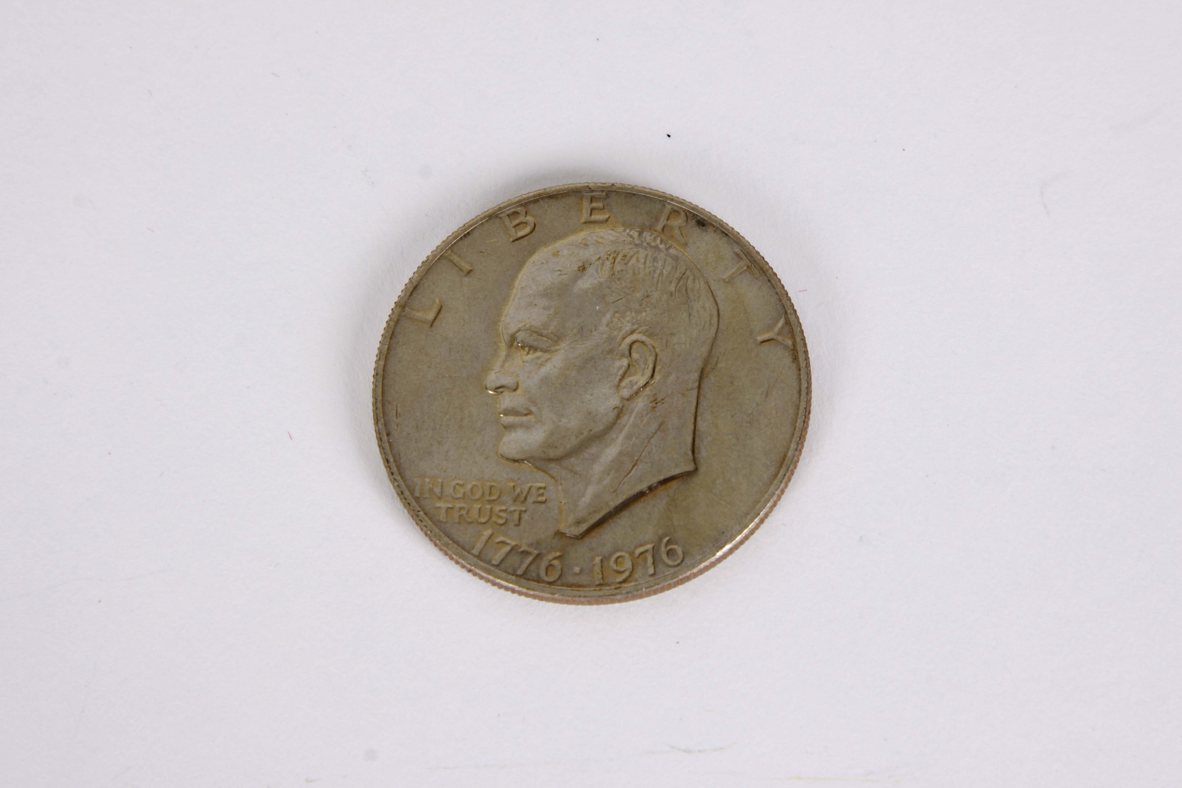 A Group of United States Silver Dollars and Half Dollars