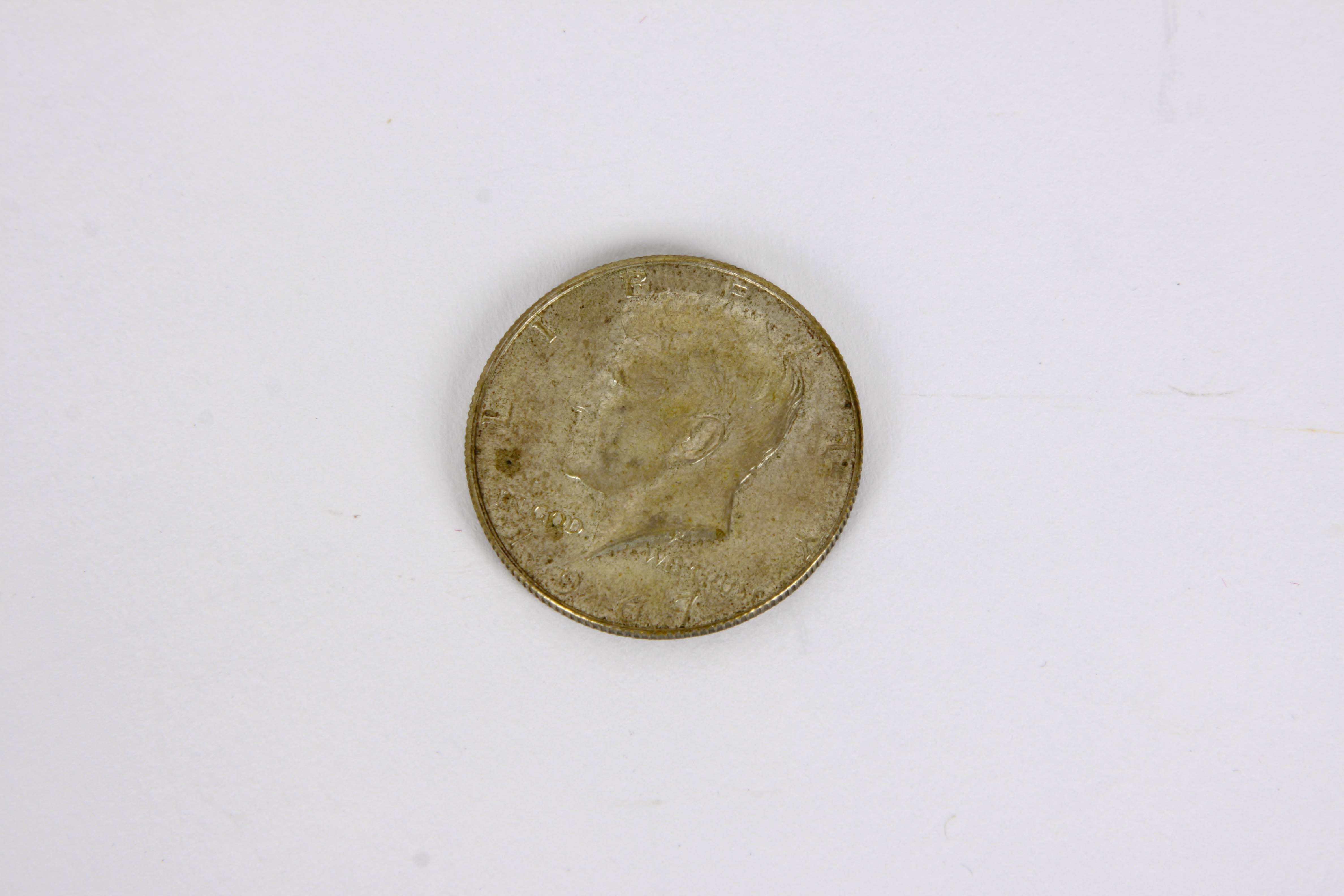 A Group of United States Silver Dollars and Half Dollars