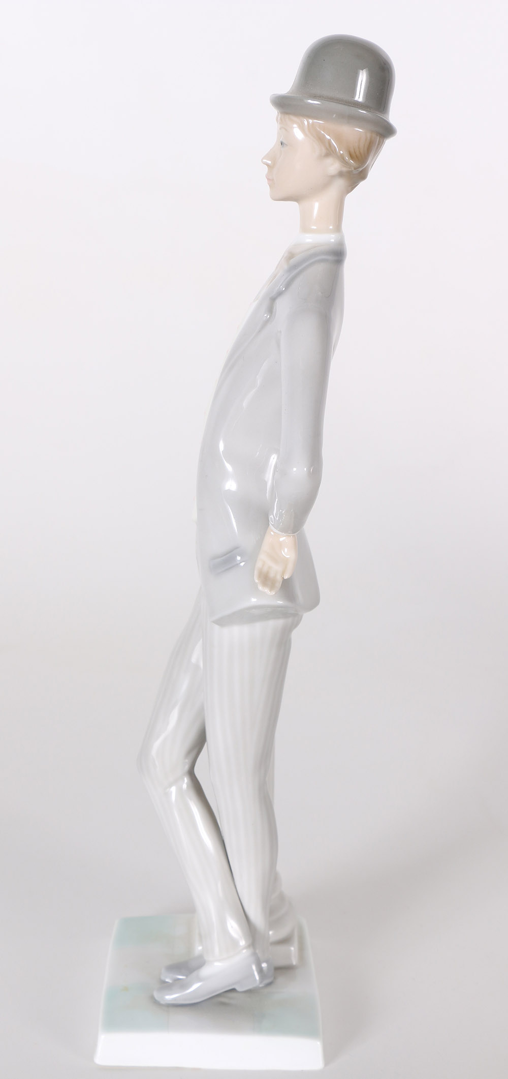 Lladró "Boy with Bowler" Porcelain Figurine