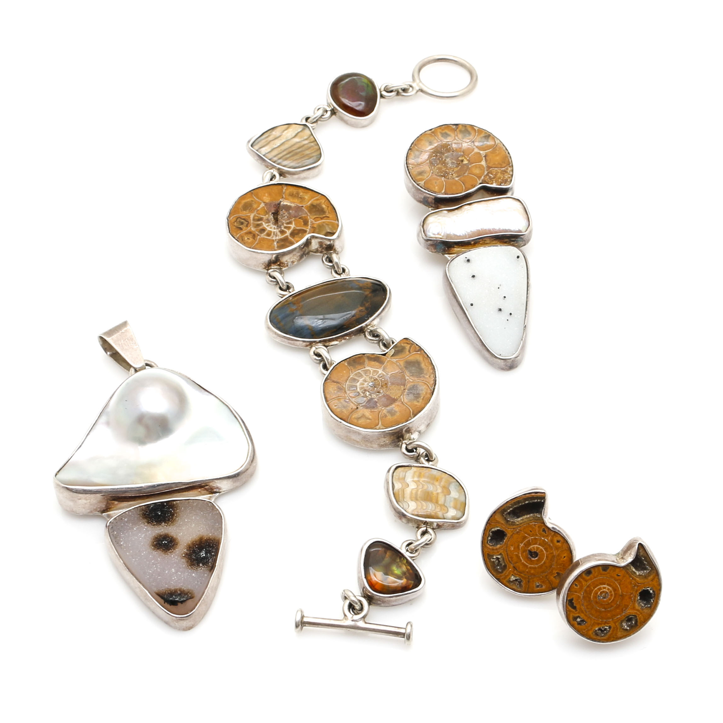 Sterling Silver Pieces With Ammonite and Various Gemstones