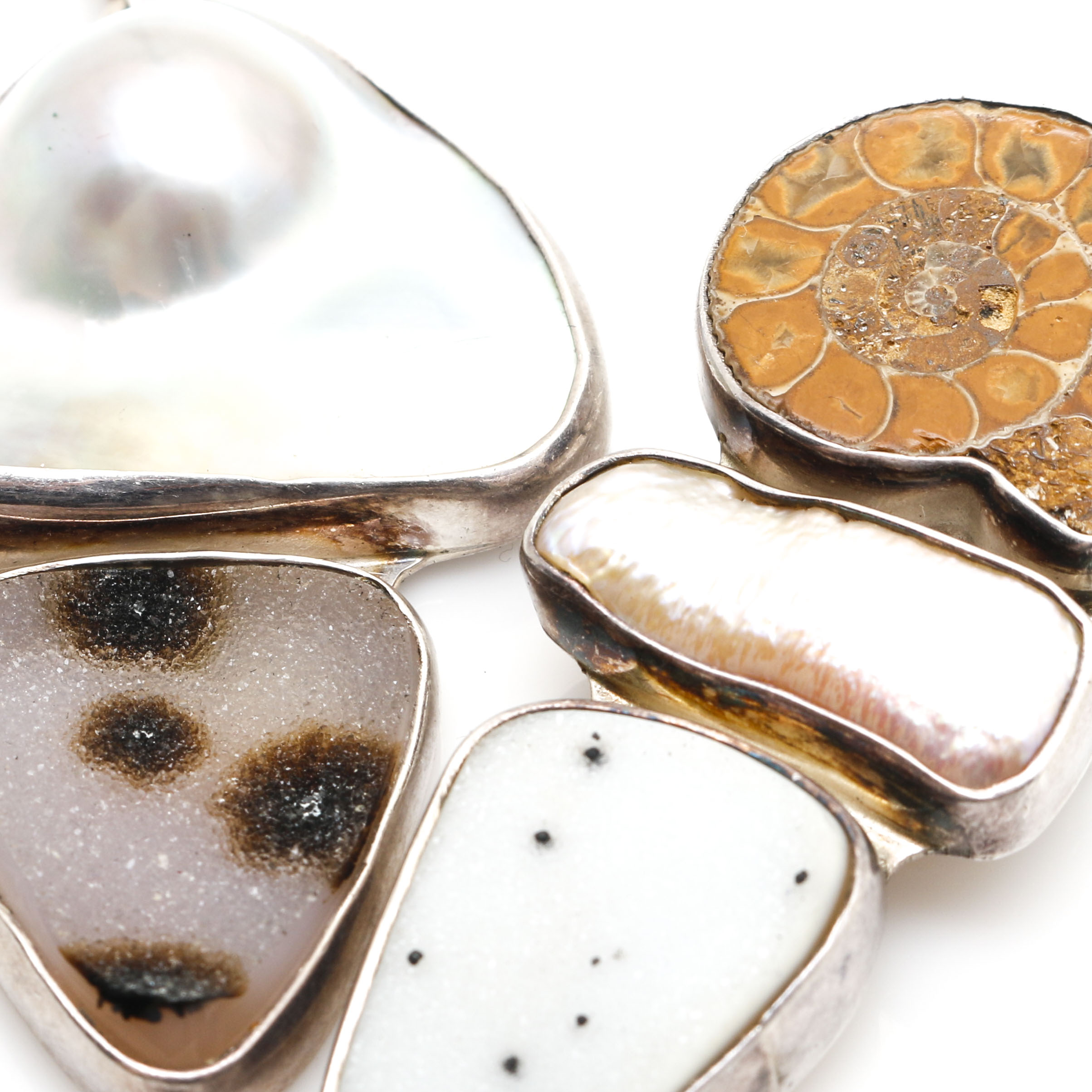 Sterling Silver Pieces With Ammonite and Various Gemstones