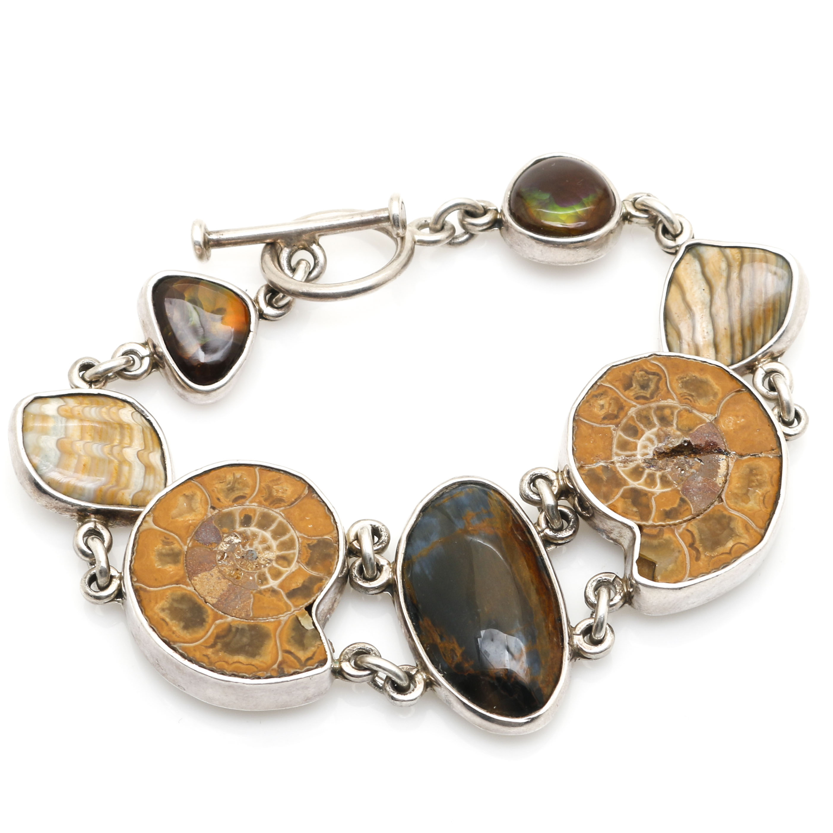 Sterling Silver Pieces With Ammonite and Various Gemstones