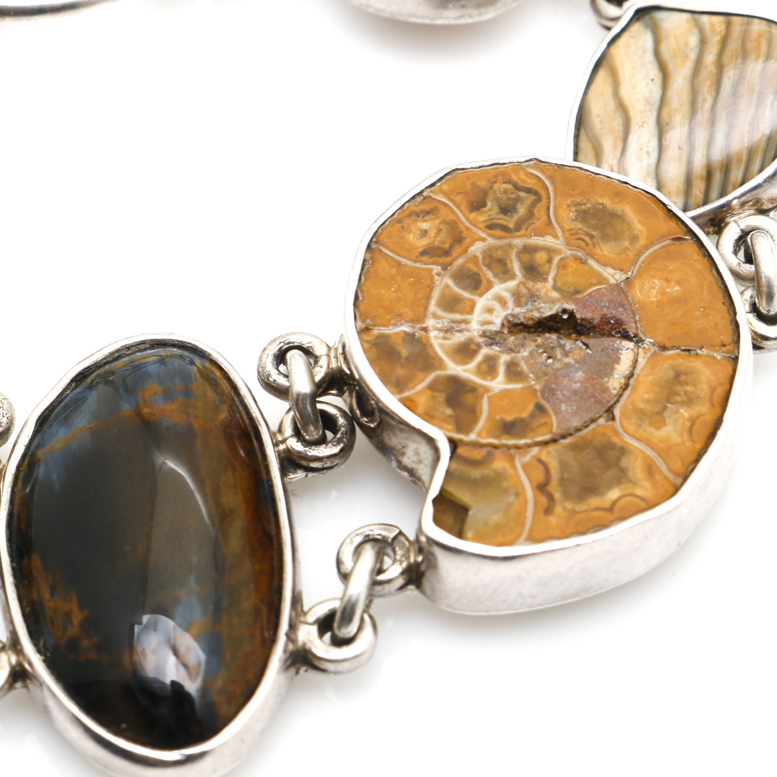 Sterling Silver Pieces With Ammonite and Various Gemstones