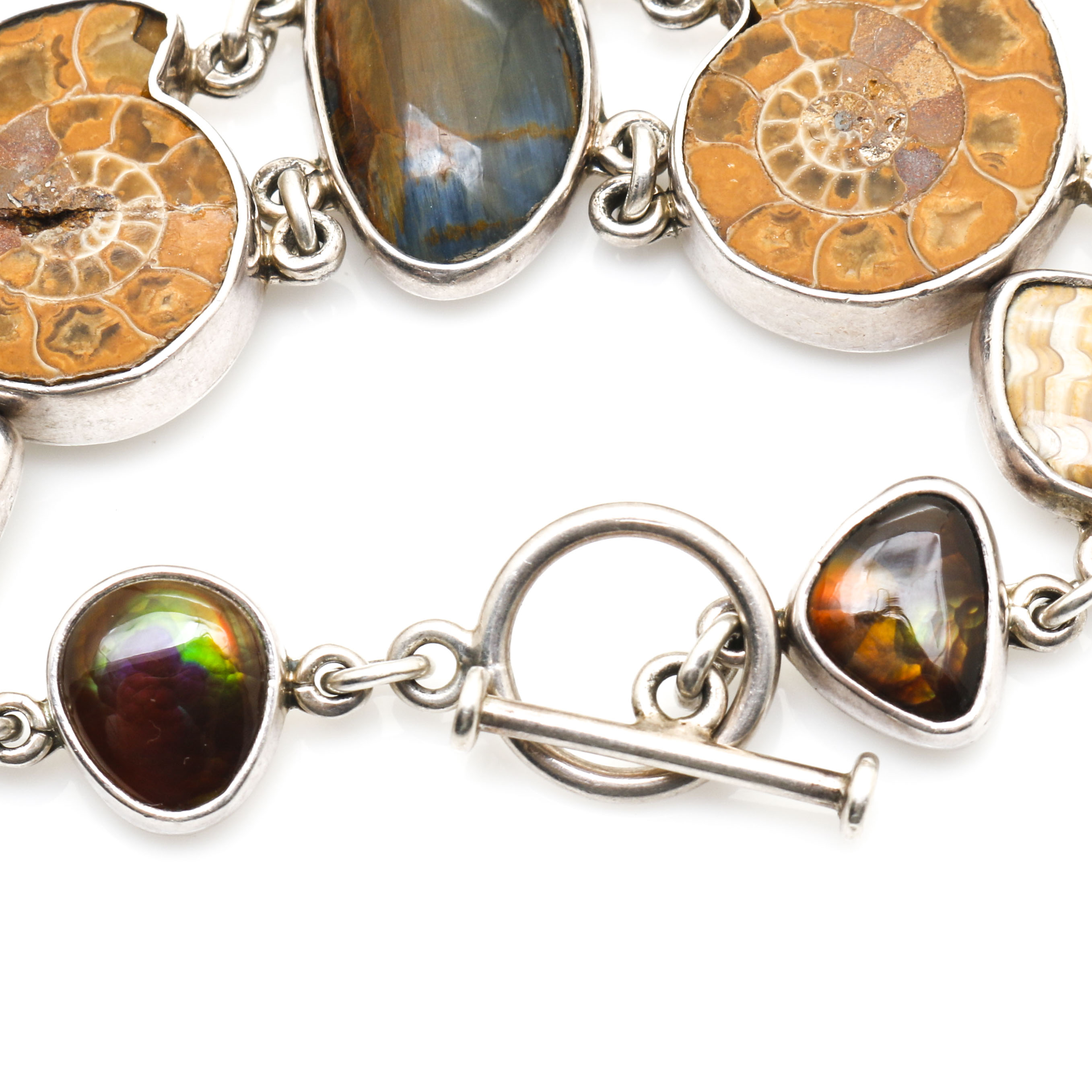 Sterling Silver Pieces With Ammonite and Various Gemstones