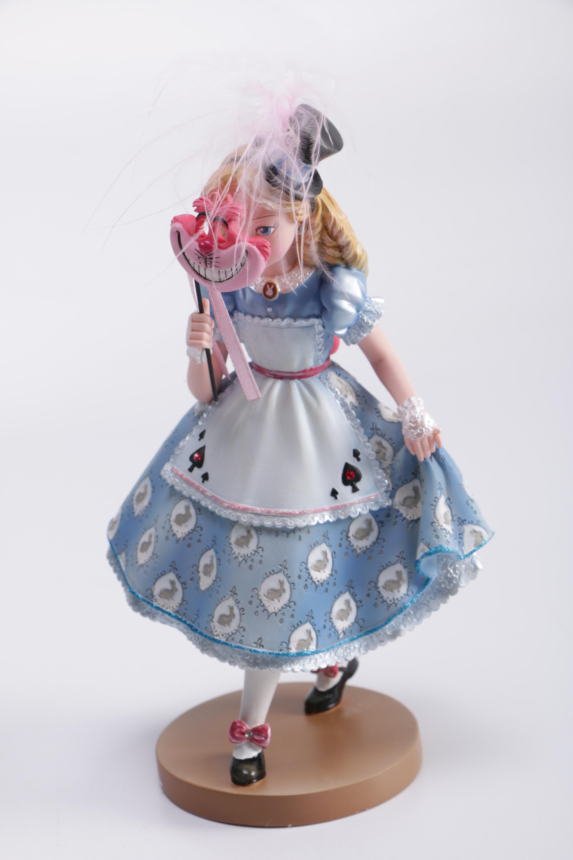 Disney Figurines Including Masquerade Snow White, Belle, and Alice