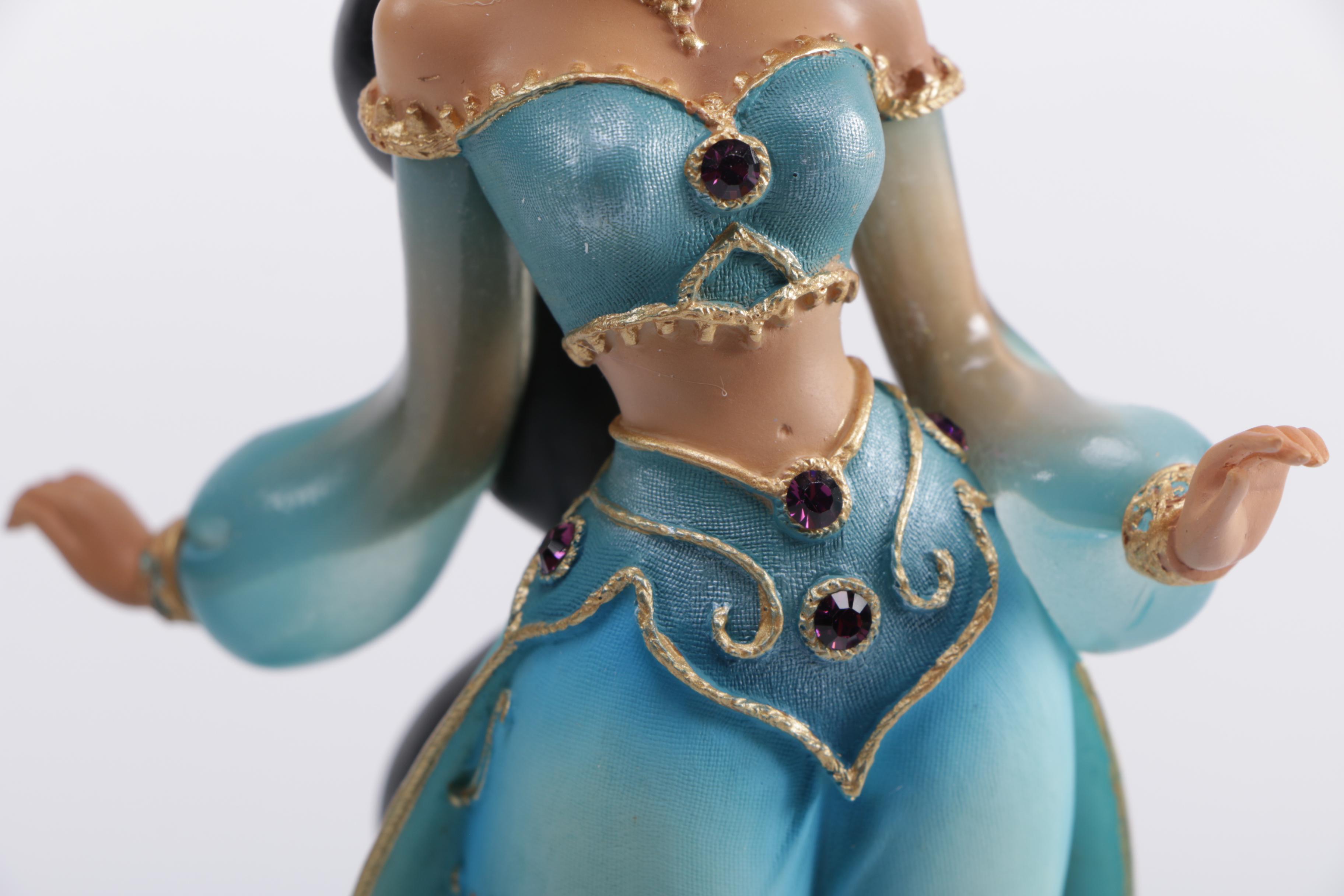 Disney Figurines Including Masquerade Snow White, Belle, and Alice