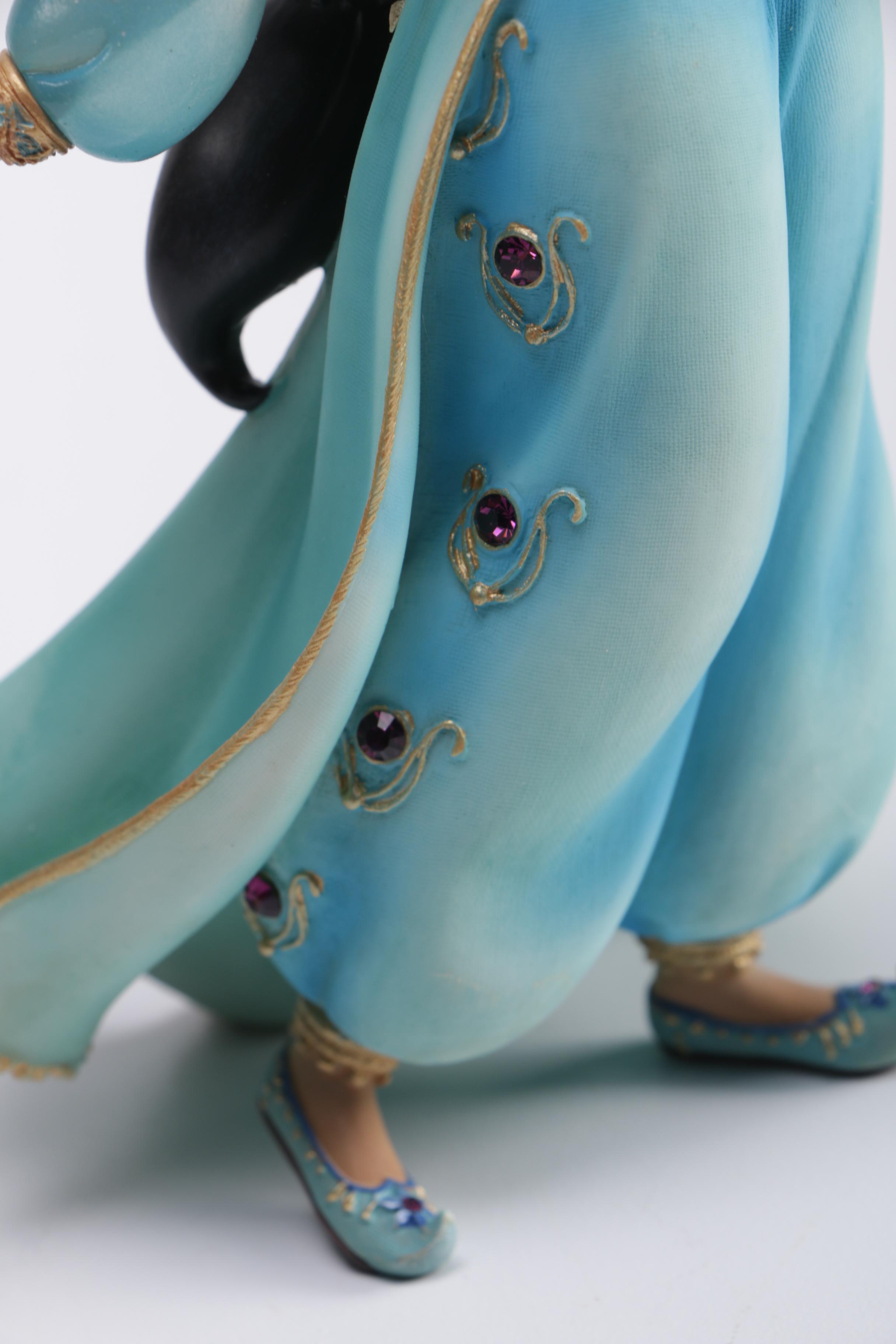 Disney Figurines Including Masquerade Snow White, Belle, and Alice