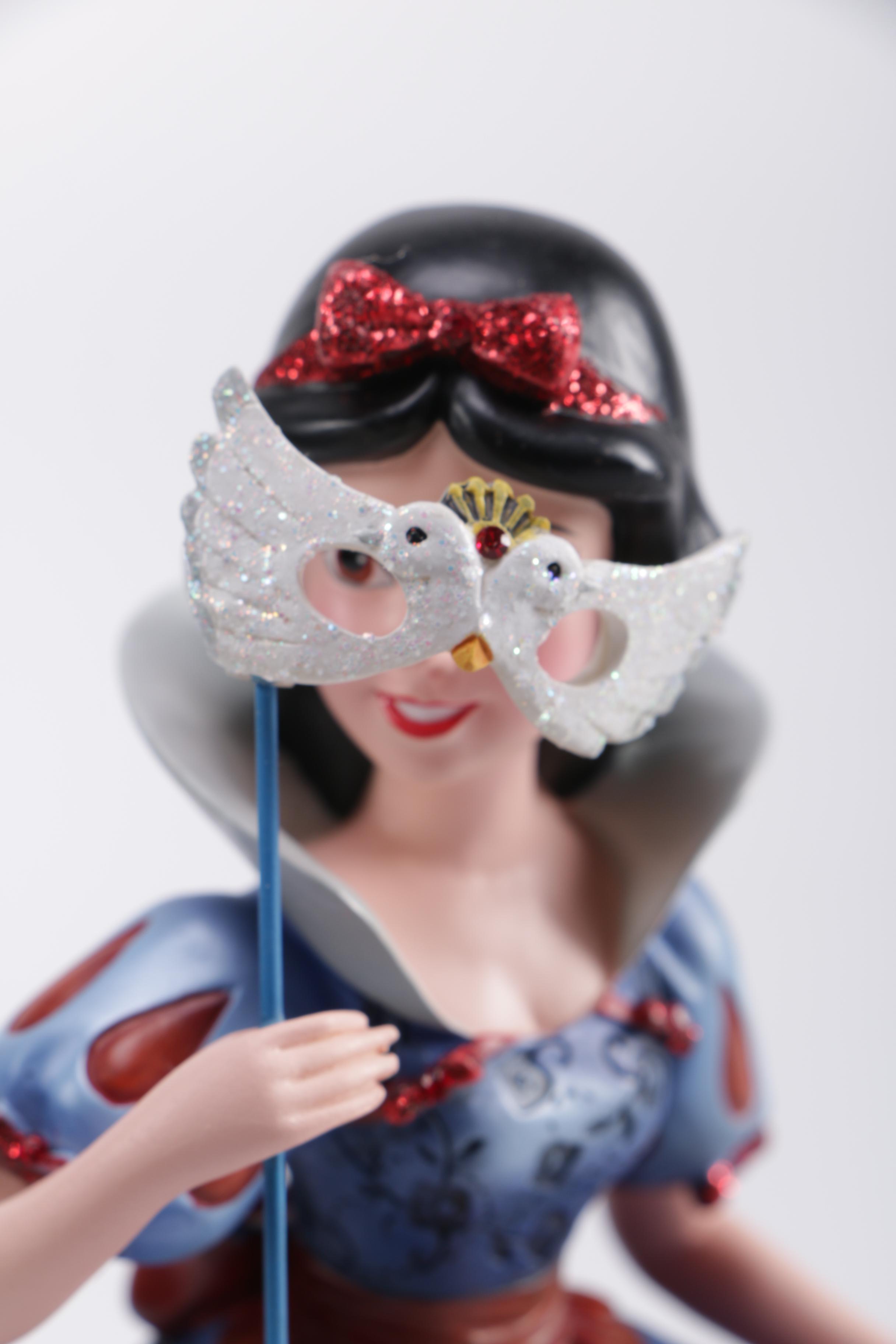 Disney Figurines Including Masquerade Snow White, Belle, and Alice