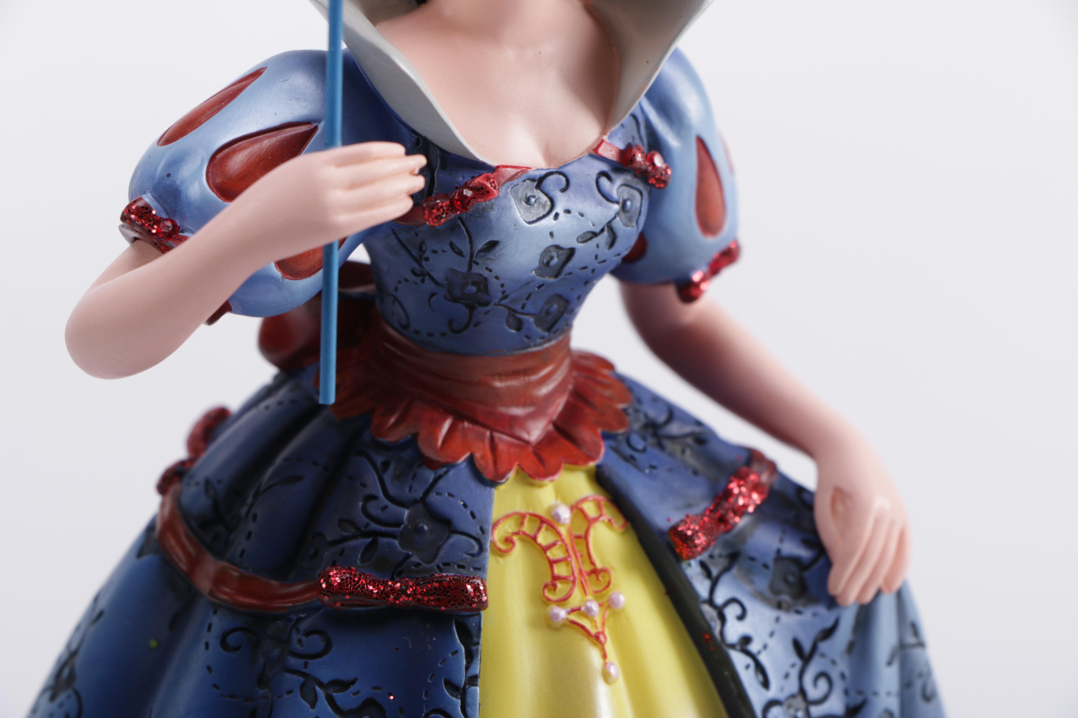Disney Figurines Including Masquerade Snow White, Belle, and Alice