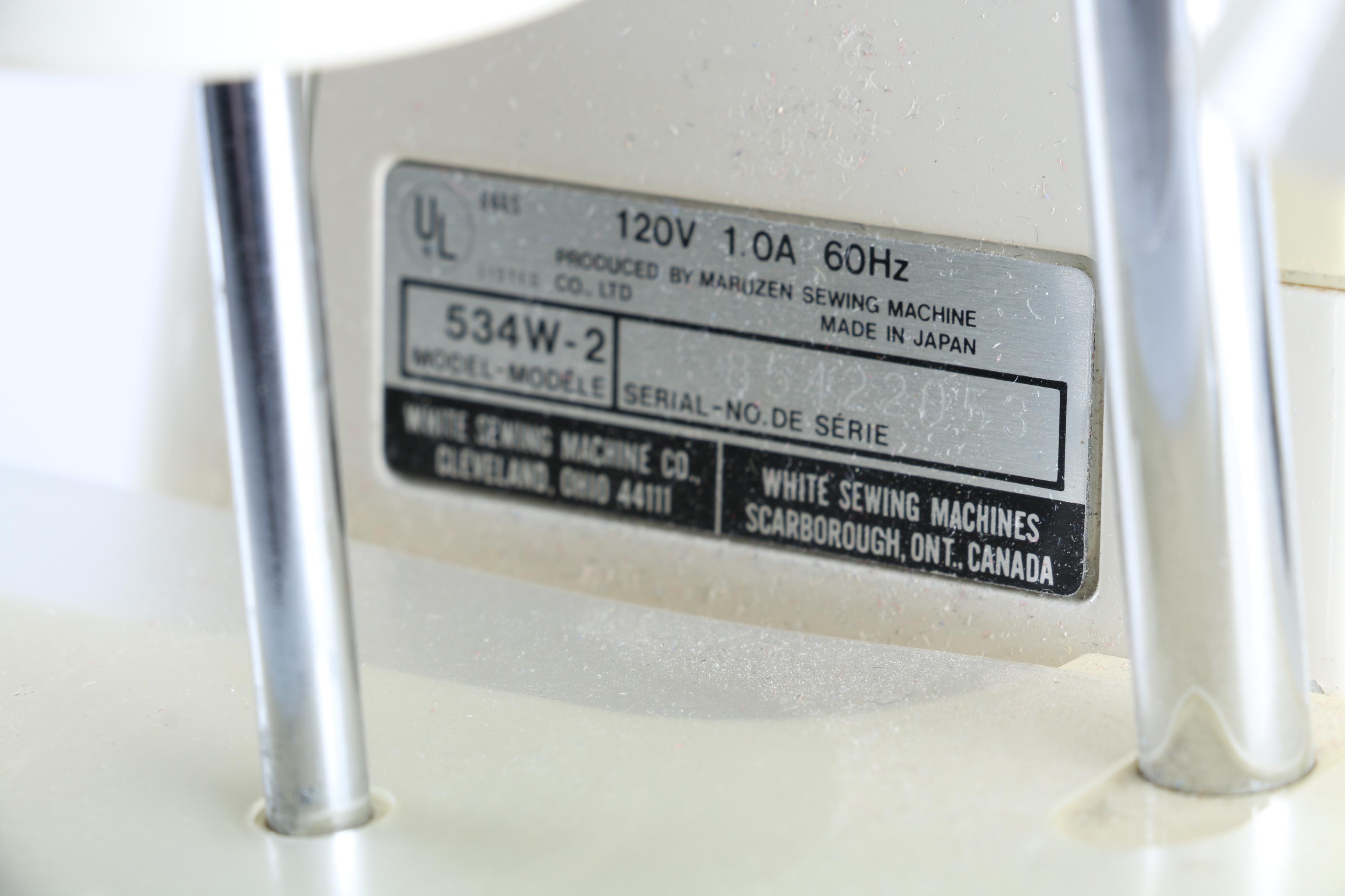 White Super Lock Sewing Machine