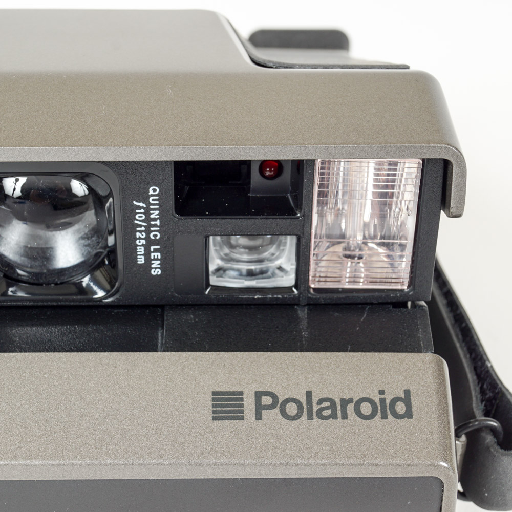 Polaroid Camera and Flashgun