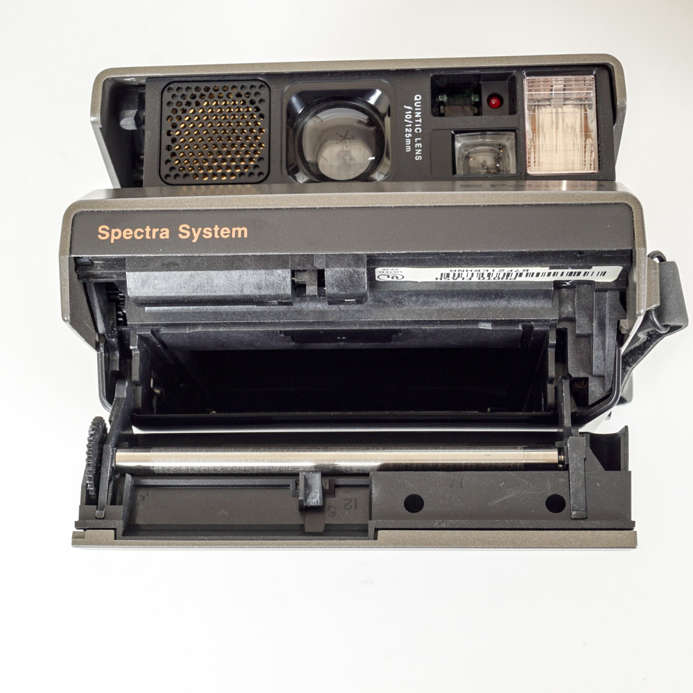 Polaroid Camera and Flashgun