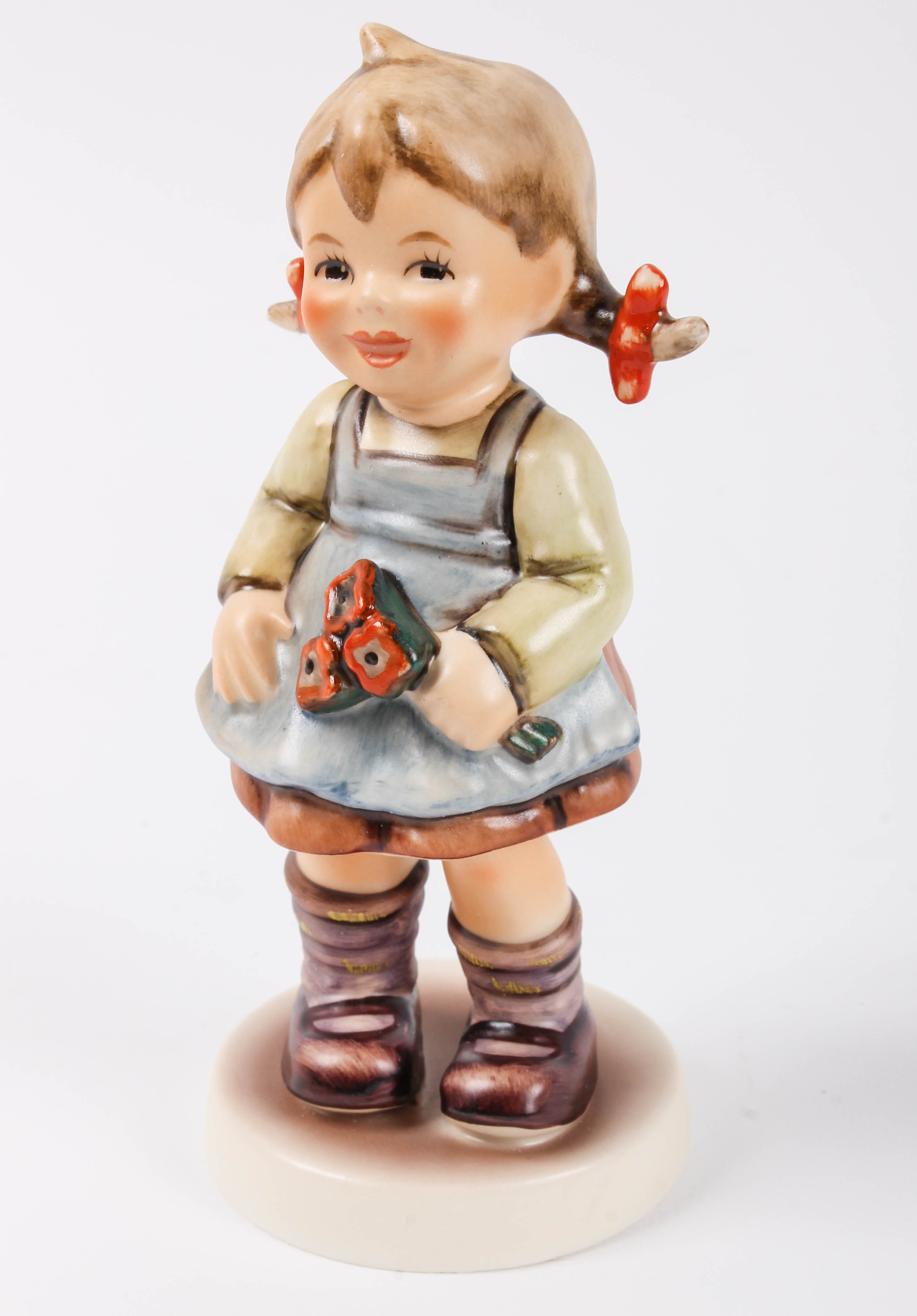 Collection of Four M.I. Hummel Club Goebel Figurines