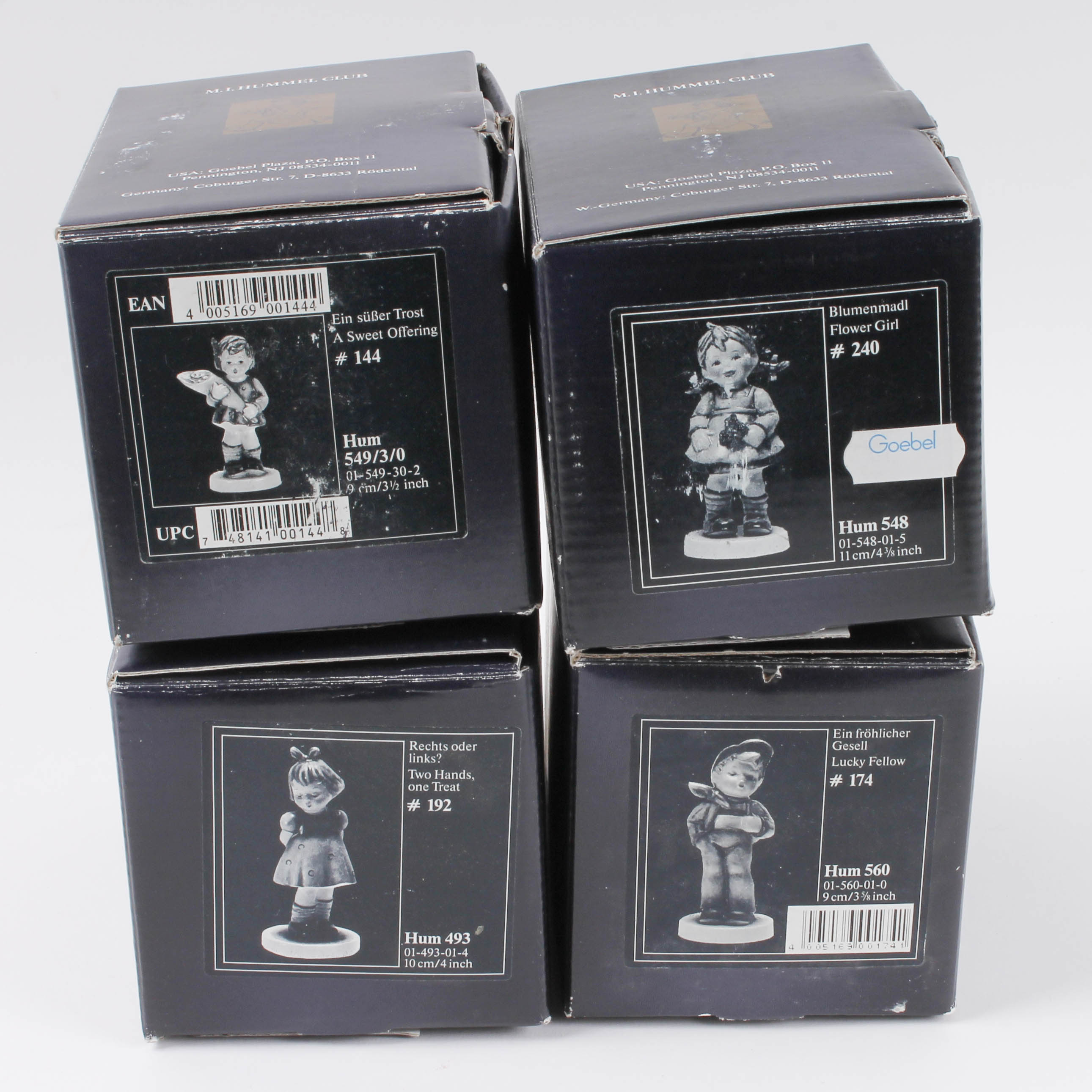 Collection of Four M.I. Hummel Club Goebel Figurines