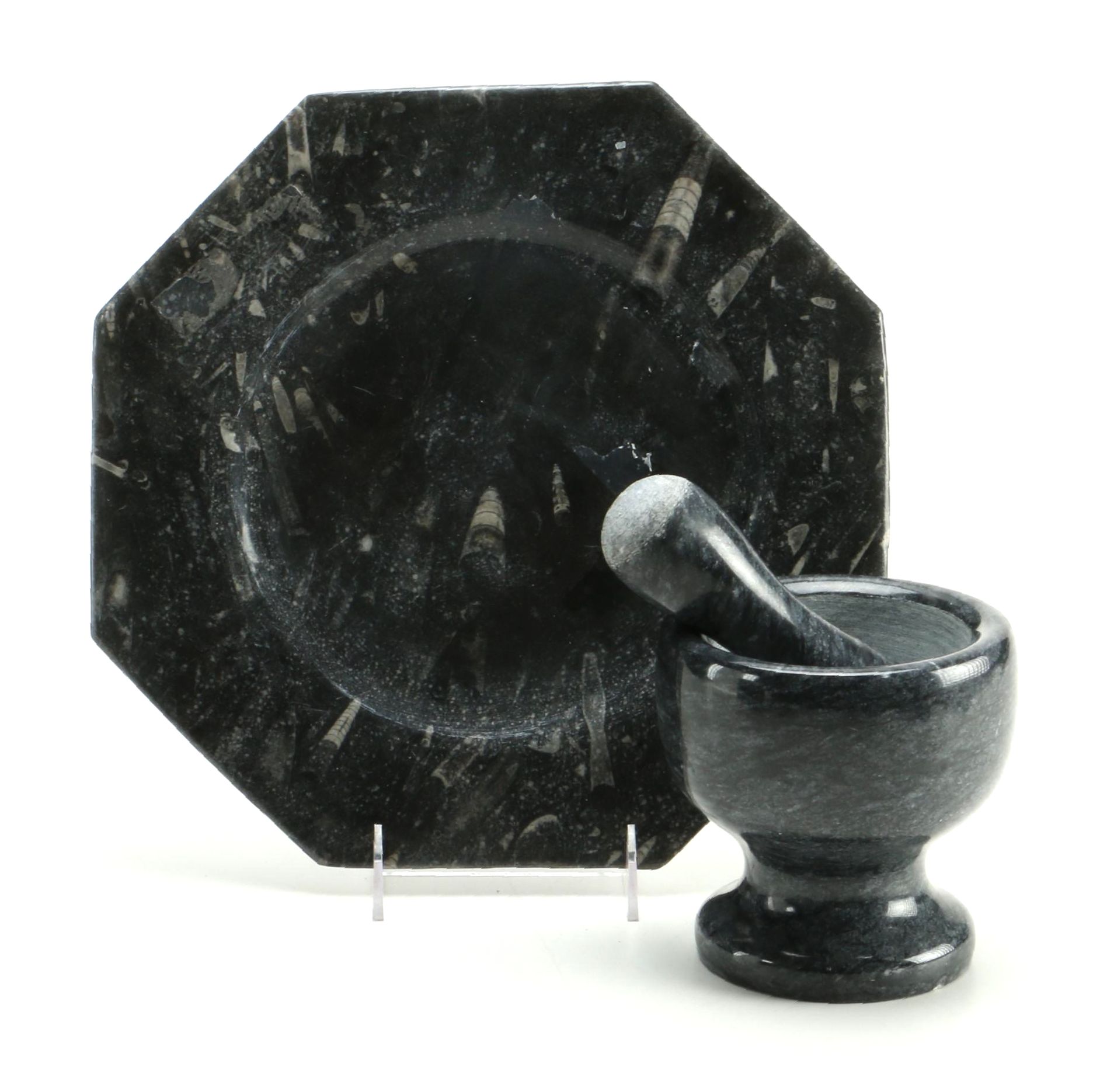 Black Fossiliferous Limestone Plate with a Mortar and Pestle