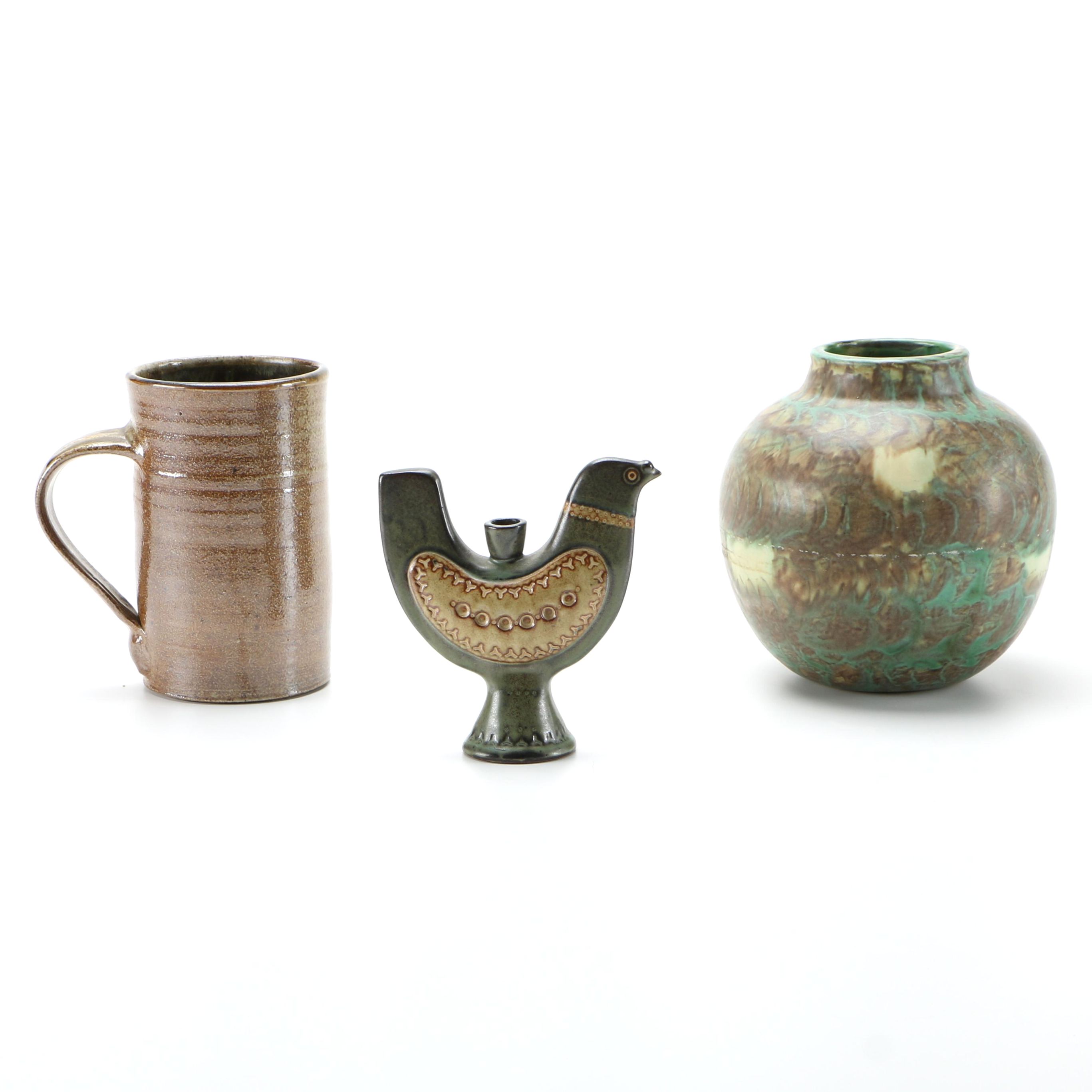 Decorative Earthenware Vessels and Figural Candle Holder