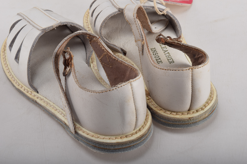 Vintage Minnetonka Toddlers' Shoes with Display Stand