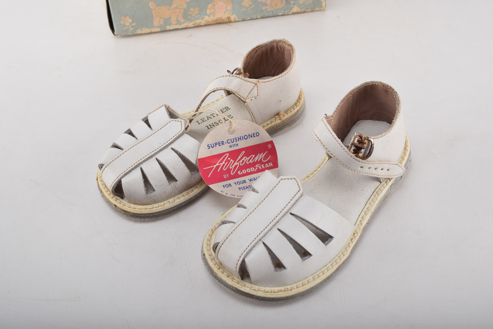 Vintage Minnetonka Toddlers' Shoes with Display Stand