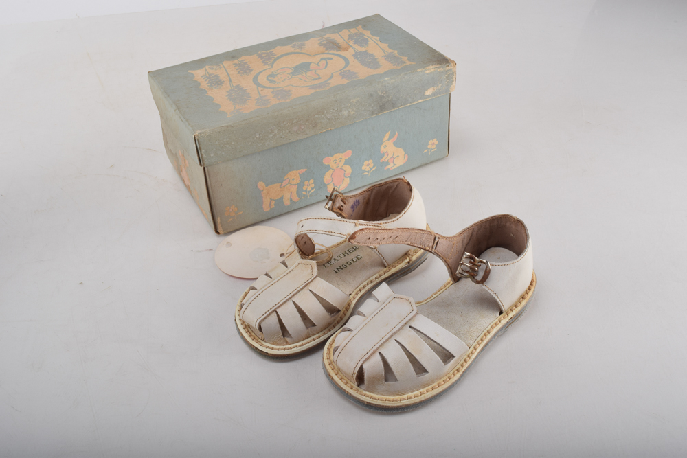 Vintage Minnetonka Toddlers' Shoes with Display Stand