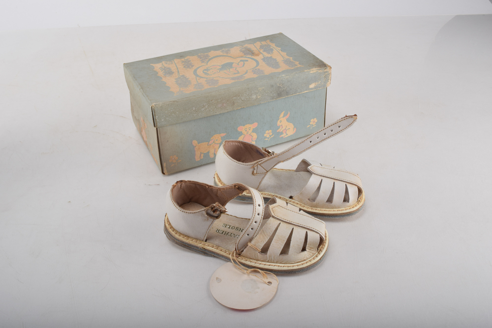 Vintage Minnetonka Toddlers' Shoes with Display Stand