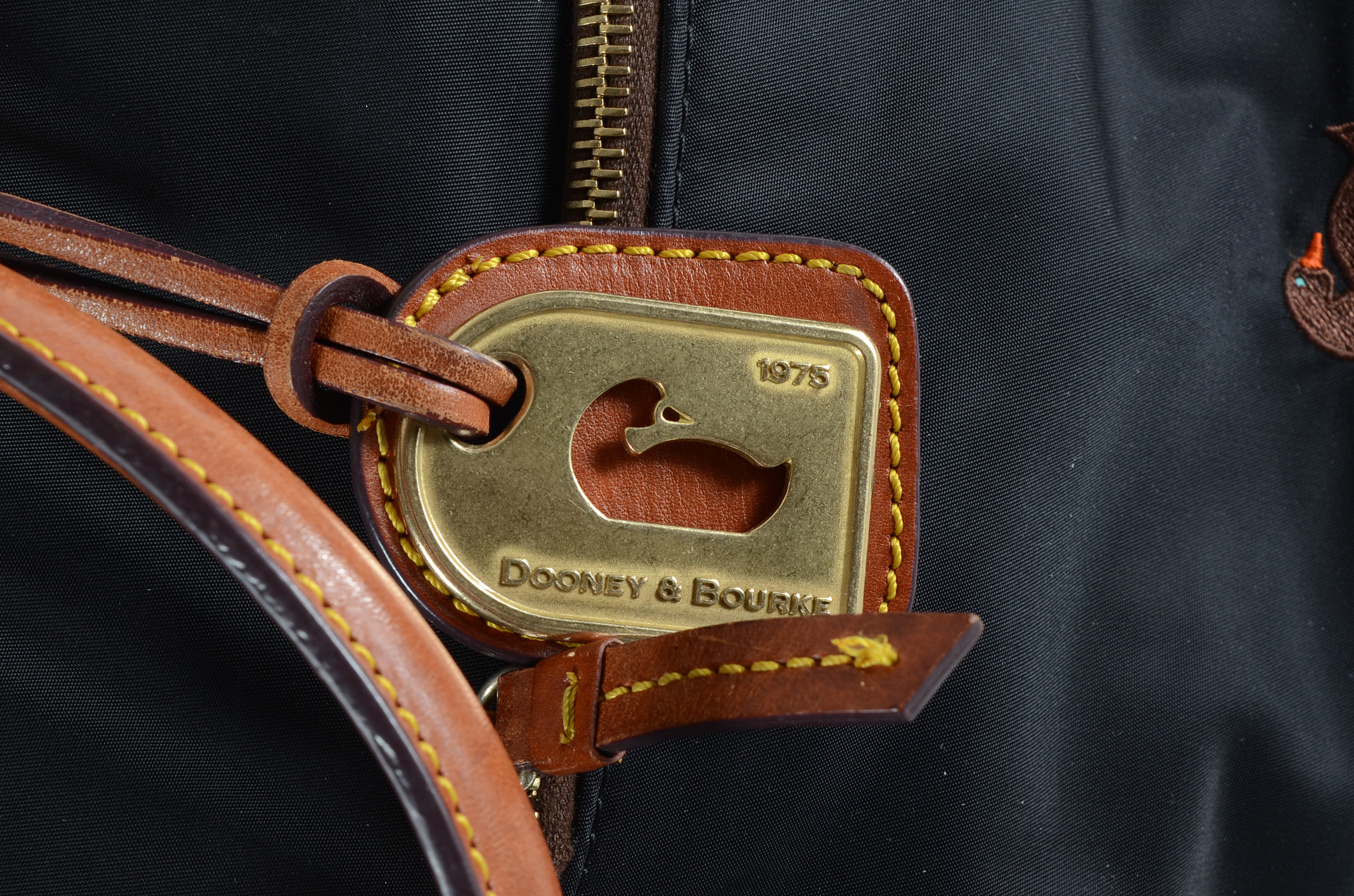 Dooney & Bourke Leather Trimmed Nylon Bag