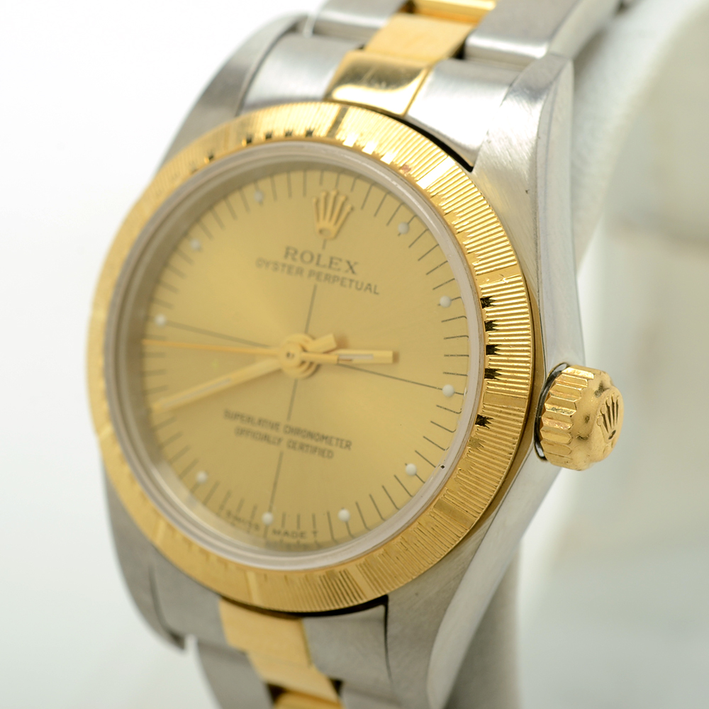 Women's Rolex Perpetual 18K Gold and Steel Champagne Automatic