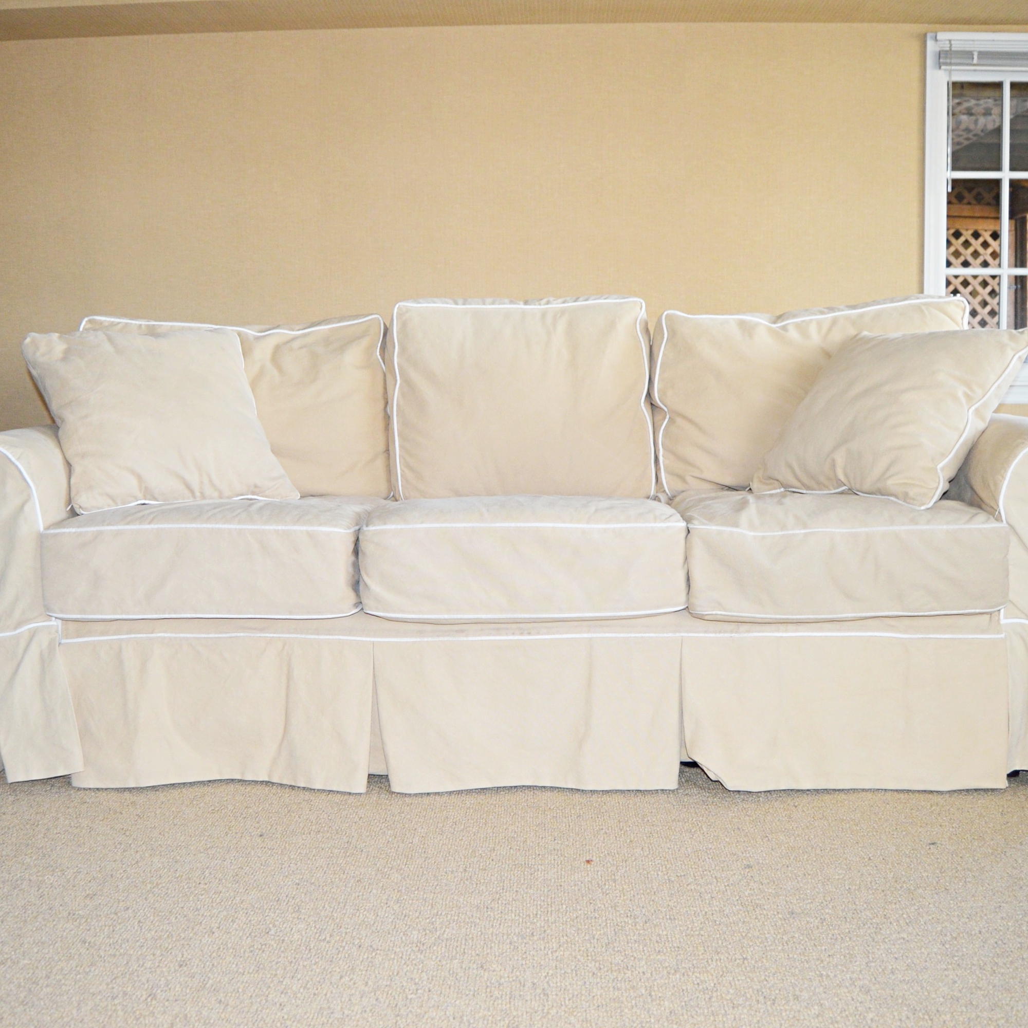 Four Seasons Tan Slipcovered Sofa