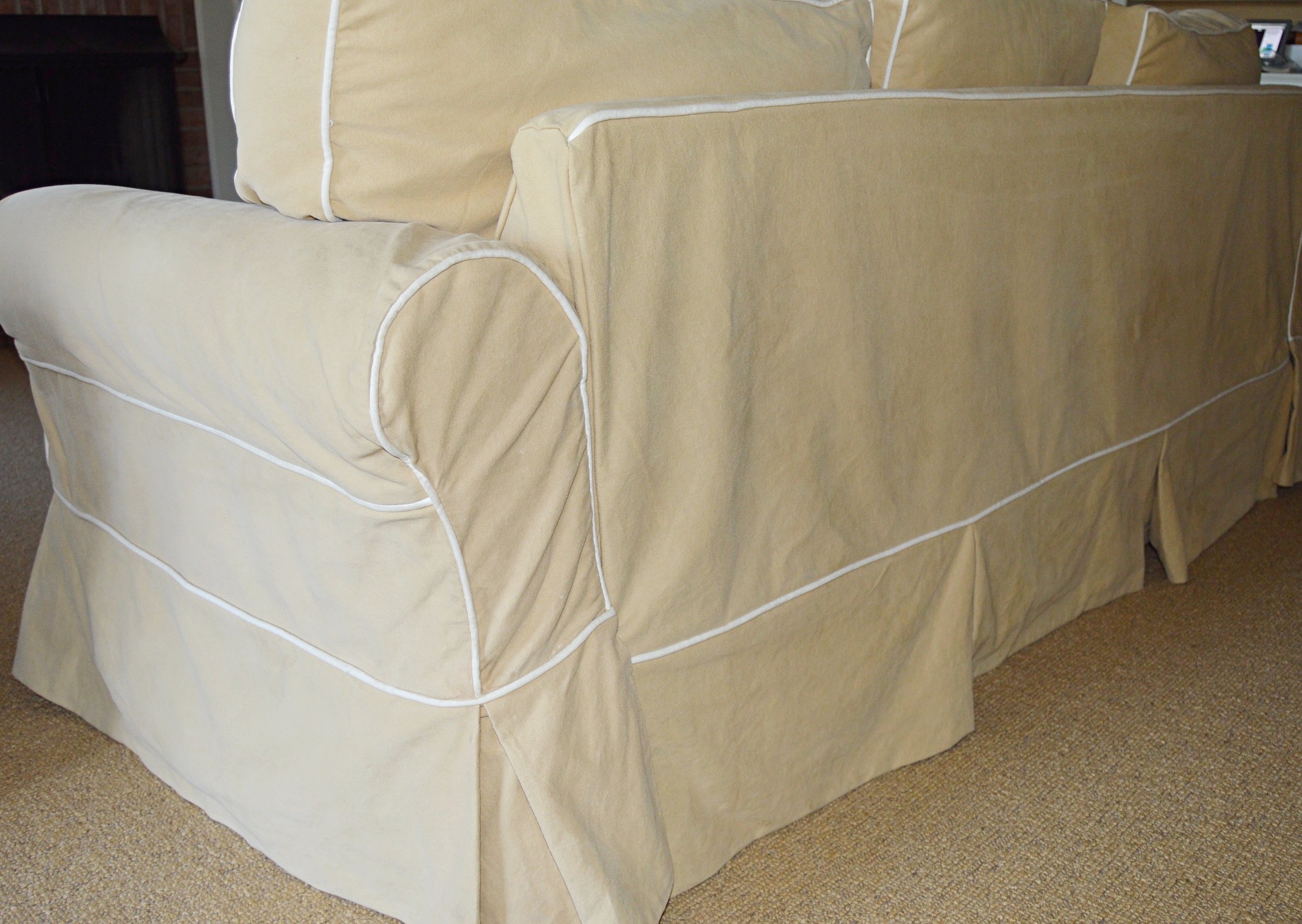 Four Seasons Tan Slipcovered Sofa