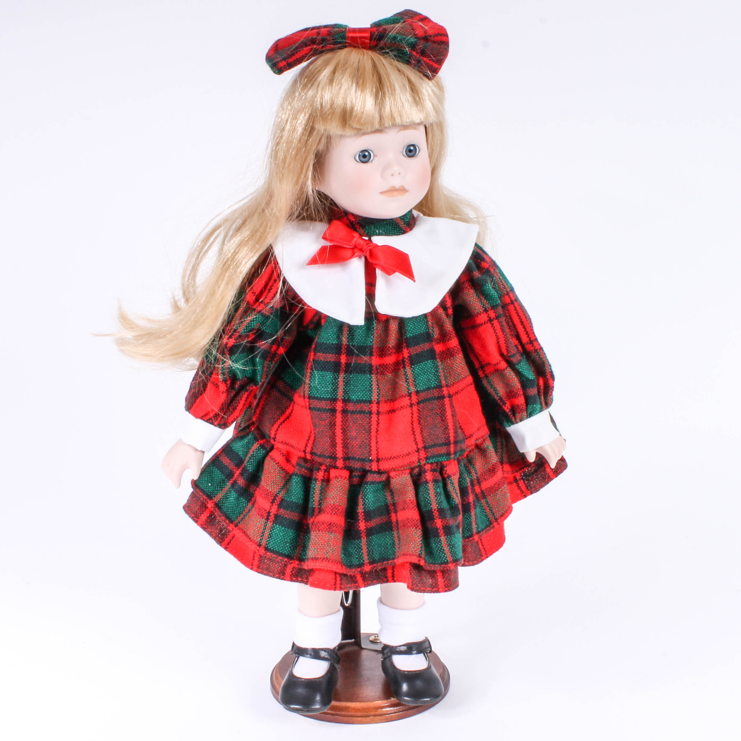 Four Porcelain Dolls by Dynasty Doll