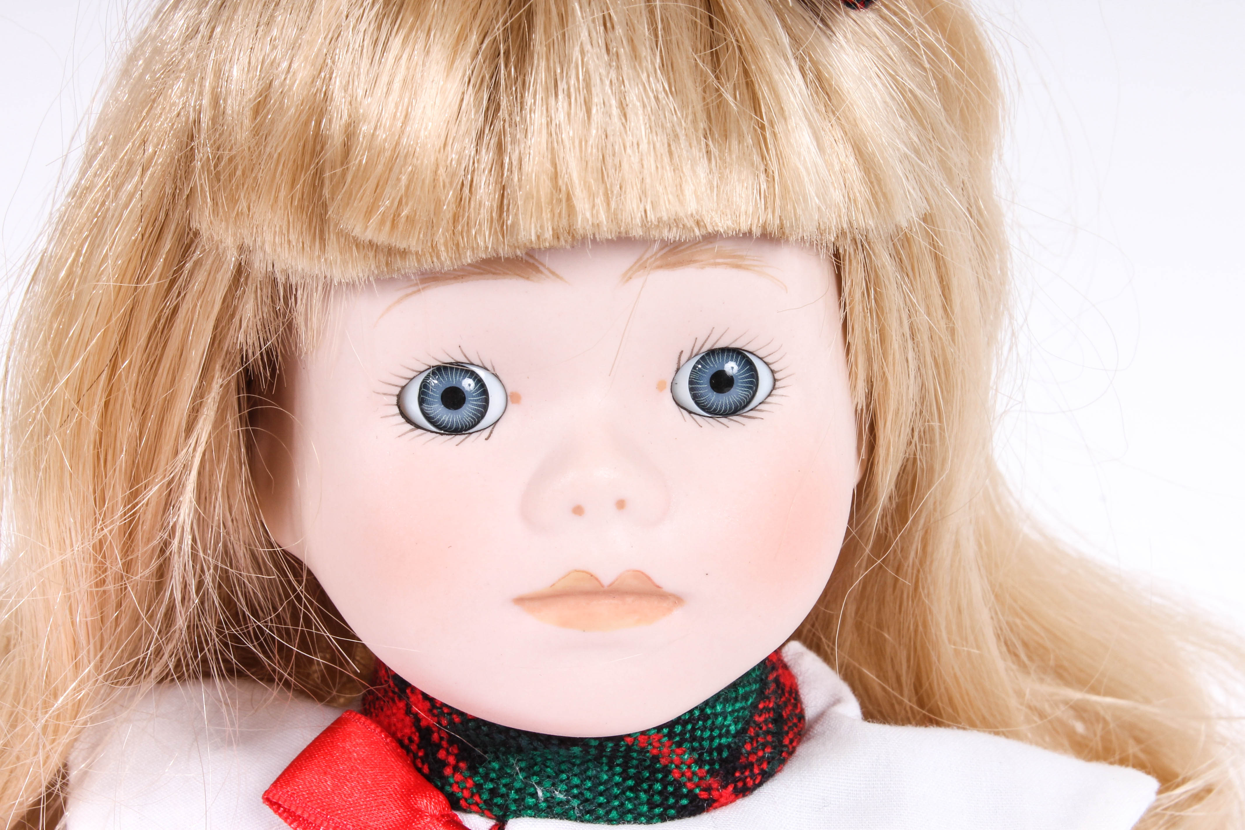 Four Porcelain Dolls by Dynasty Doll