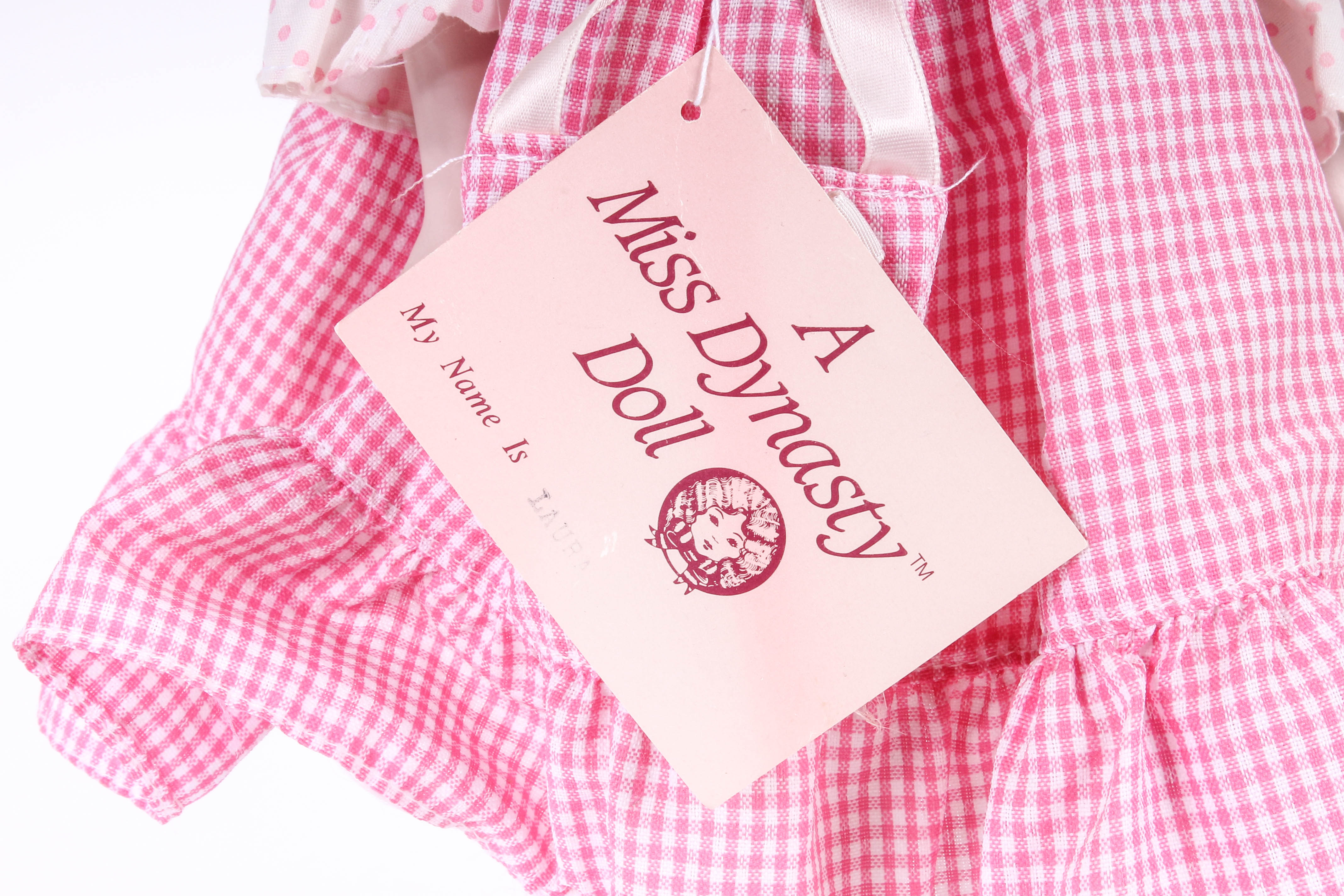 Four Porcelain Dolls by Dynasty Doll