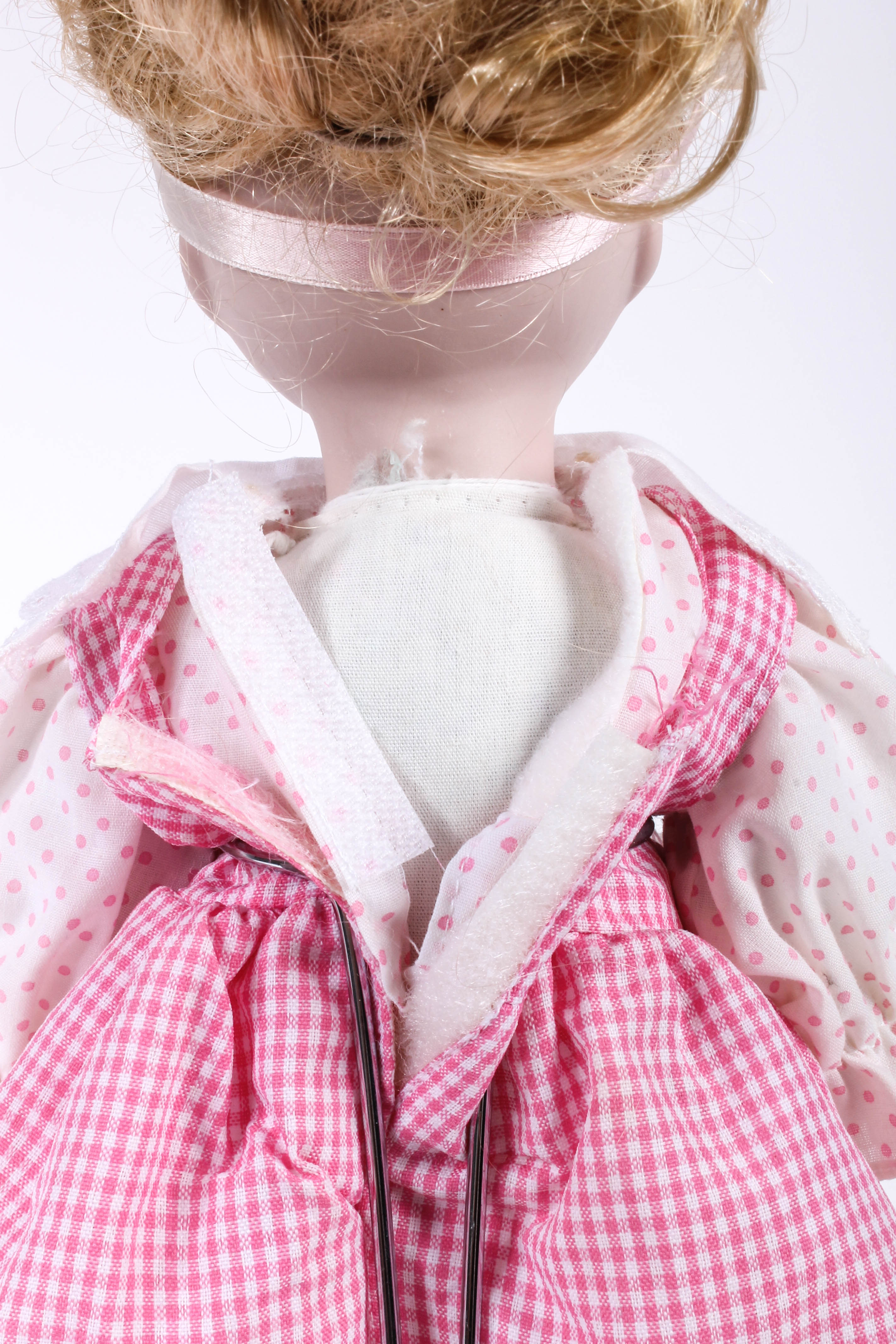 Four Porcelain Dolls by Dynasty Doll