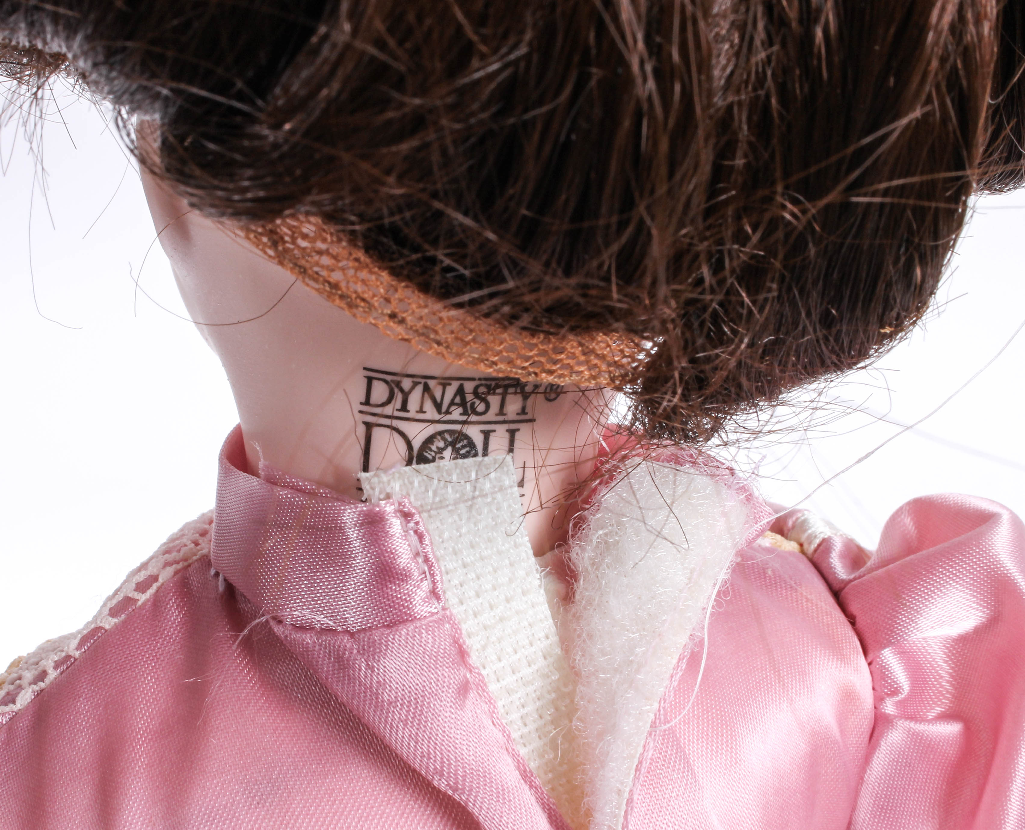 Four Porcelain Dolls by Dynasty Doll