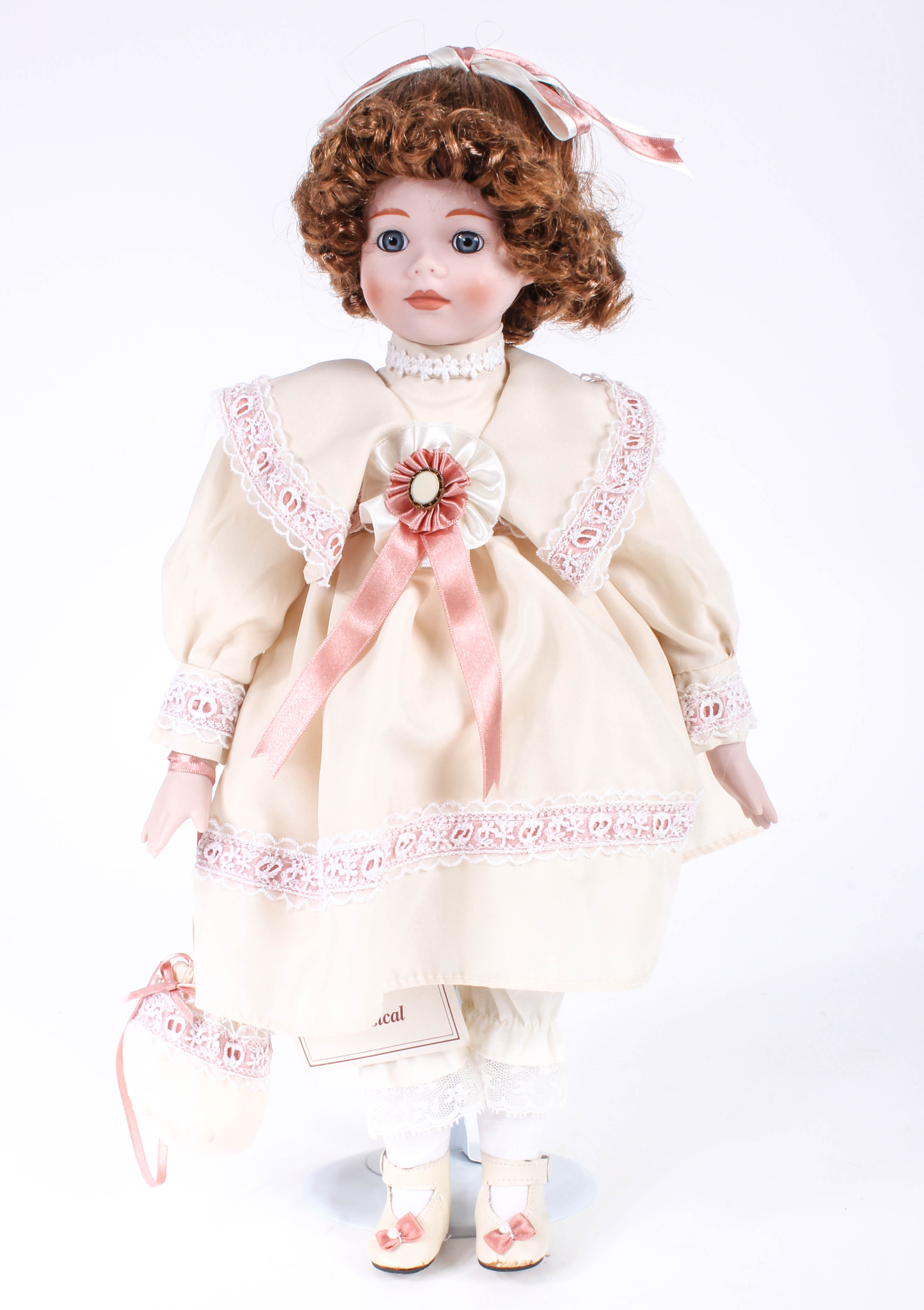 Four Porcelain Dolls by Dynasty Doll