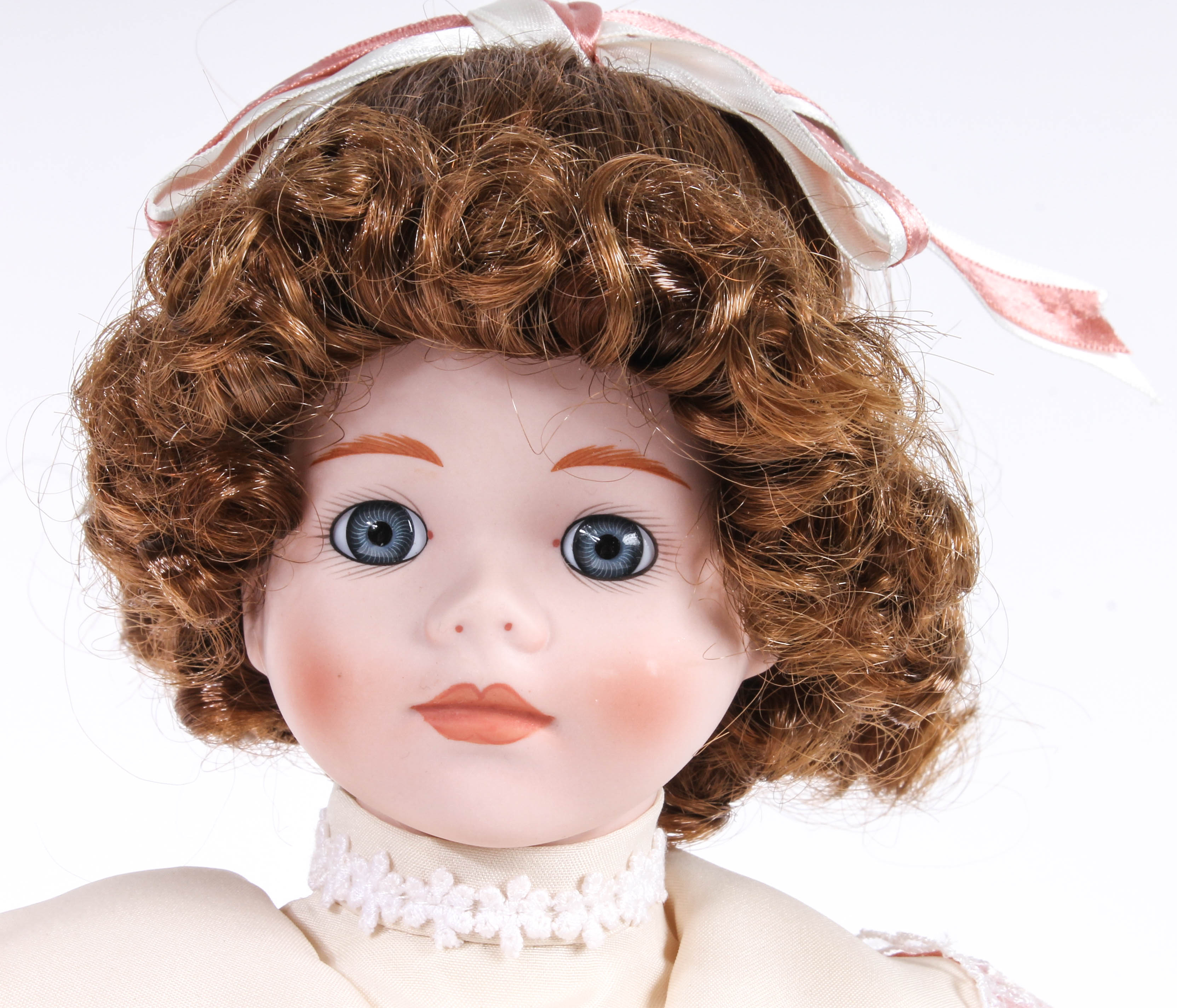 Four Porcelain Dolls by Dynasty Doll
