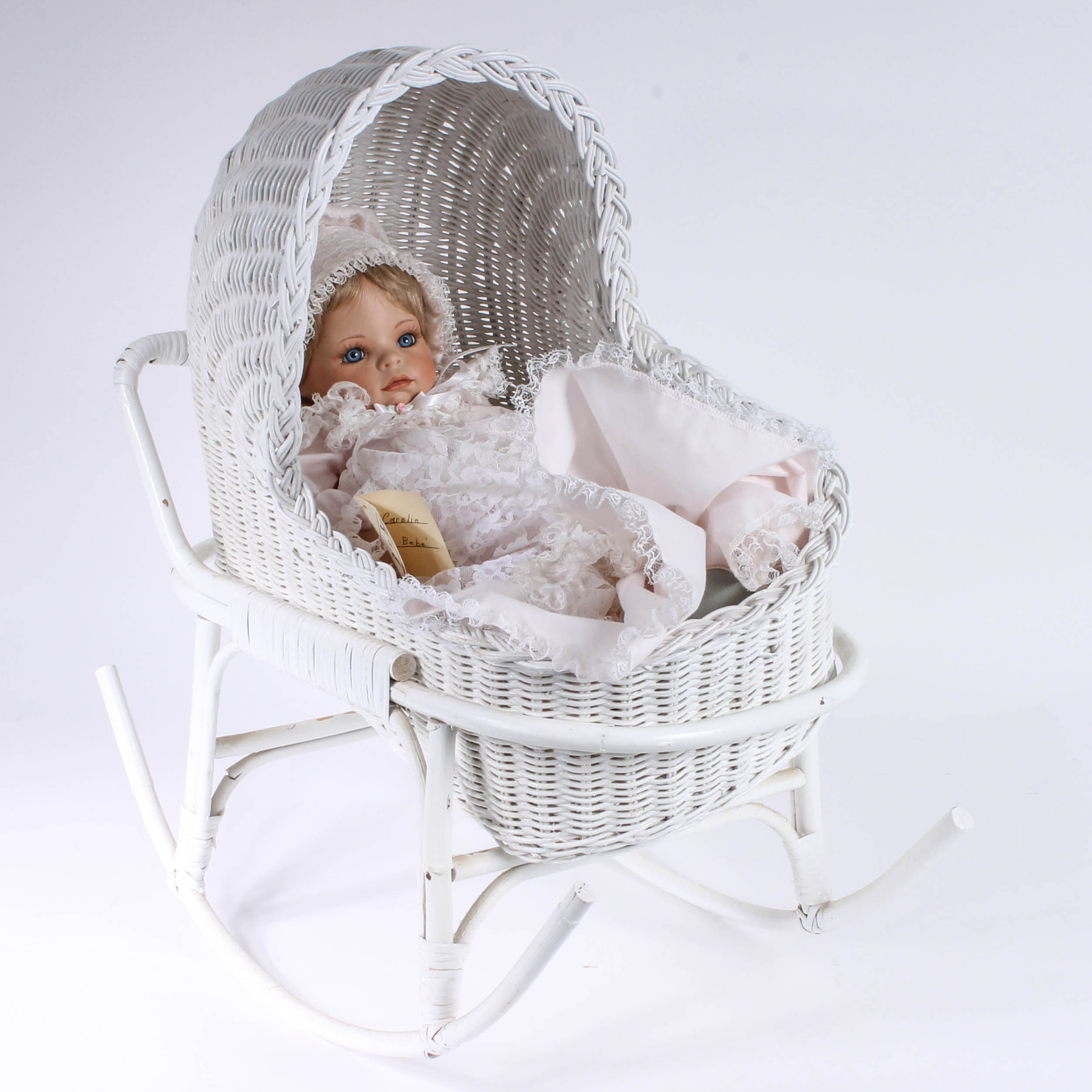 Handmade Porcelain Doll in Wicker Bassinet