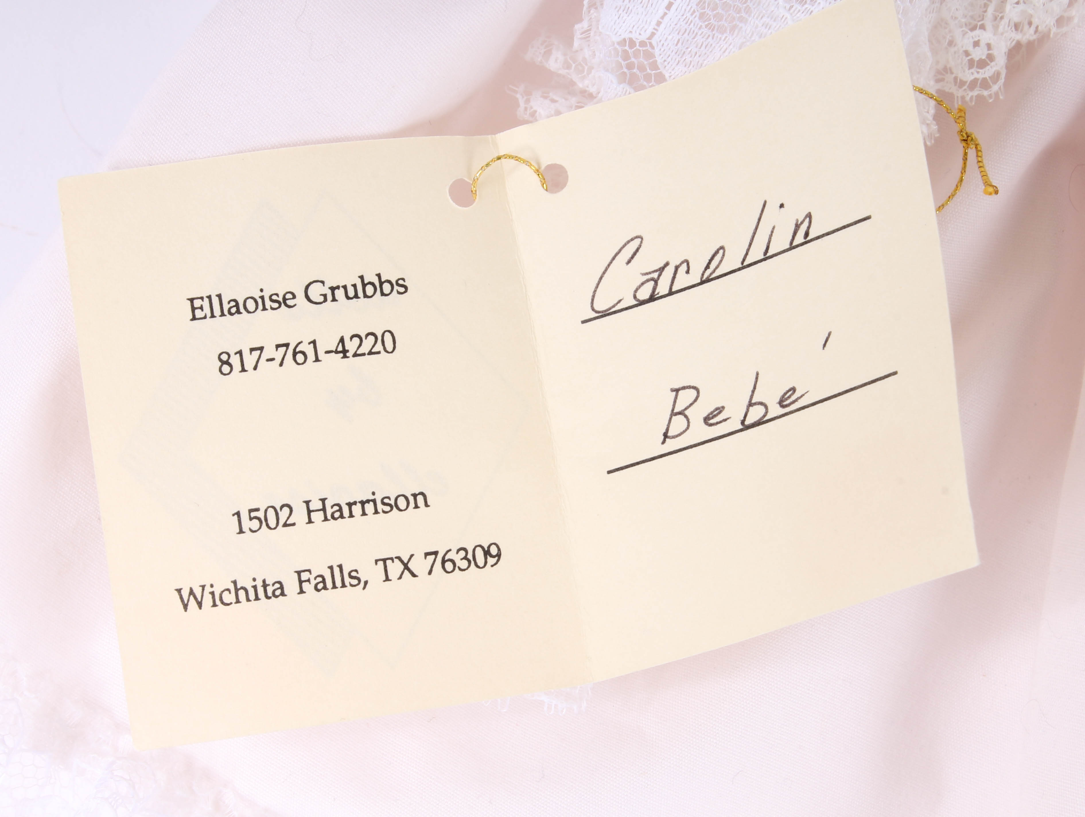 Handmade Porcelain Doll in Wicker Bassinet