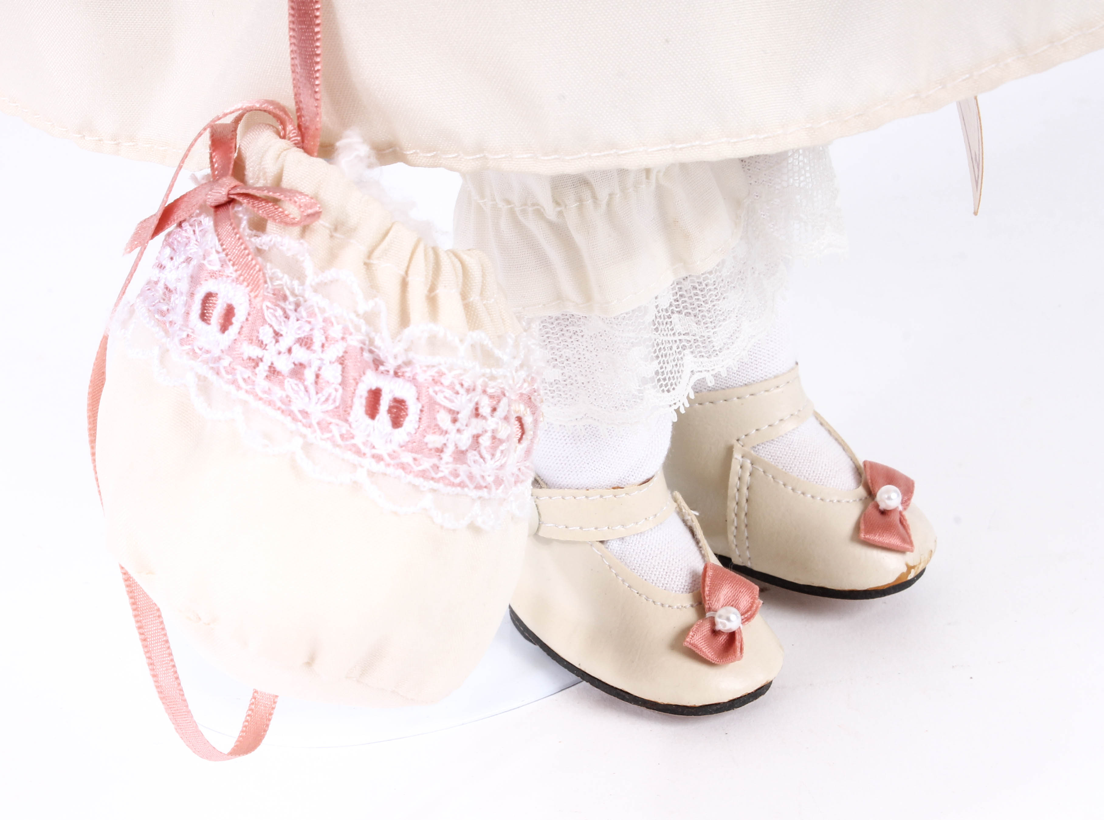 Four Porcelain Dolls by Dynasty Doll