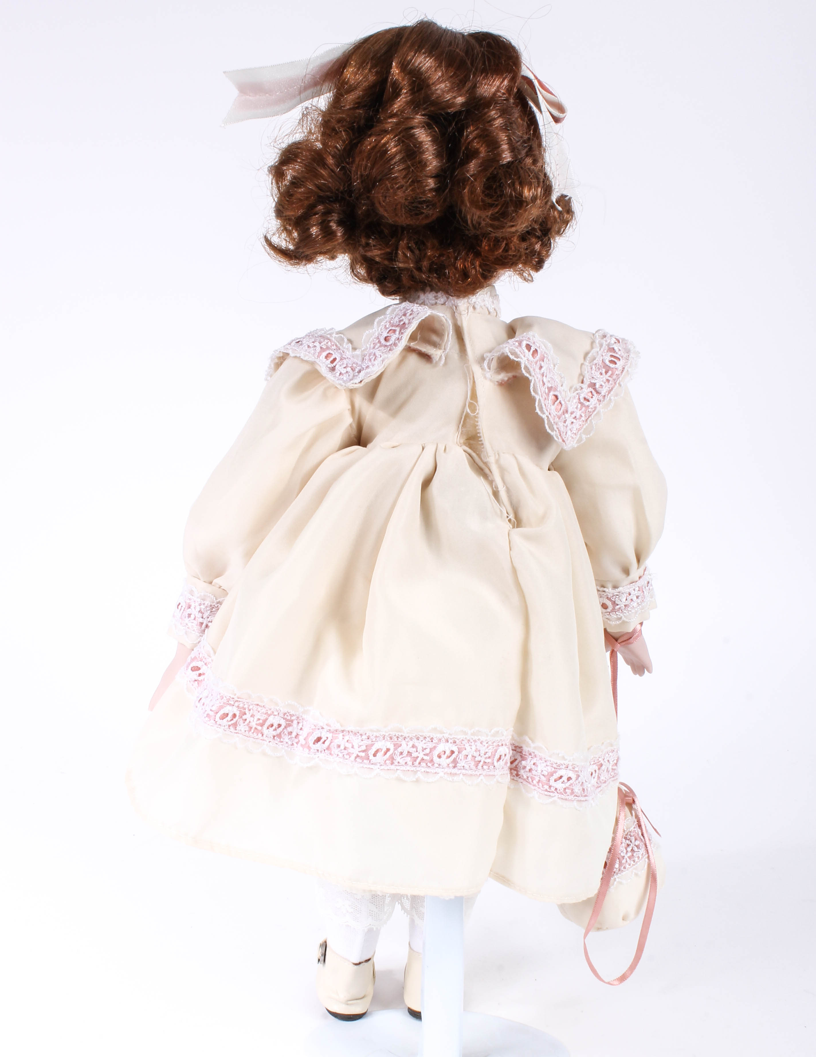 Four Porcelain Dolls by Dynasty Doll