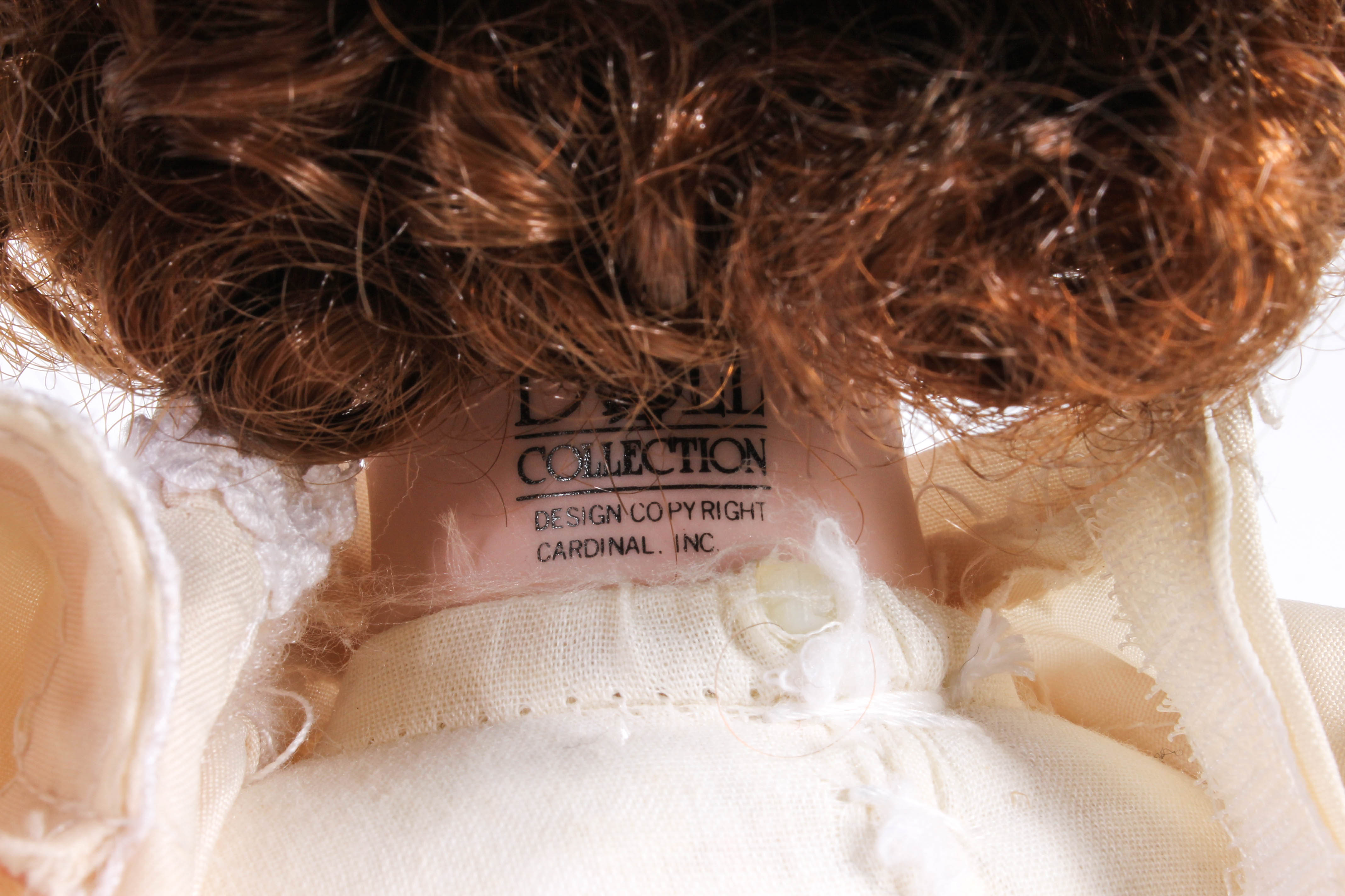 Four Porcelain Dolls by Dynasty Doll