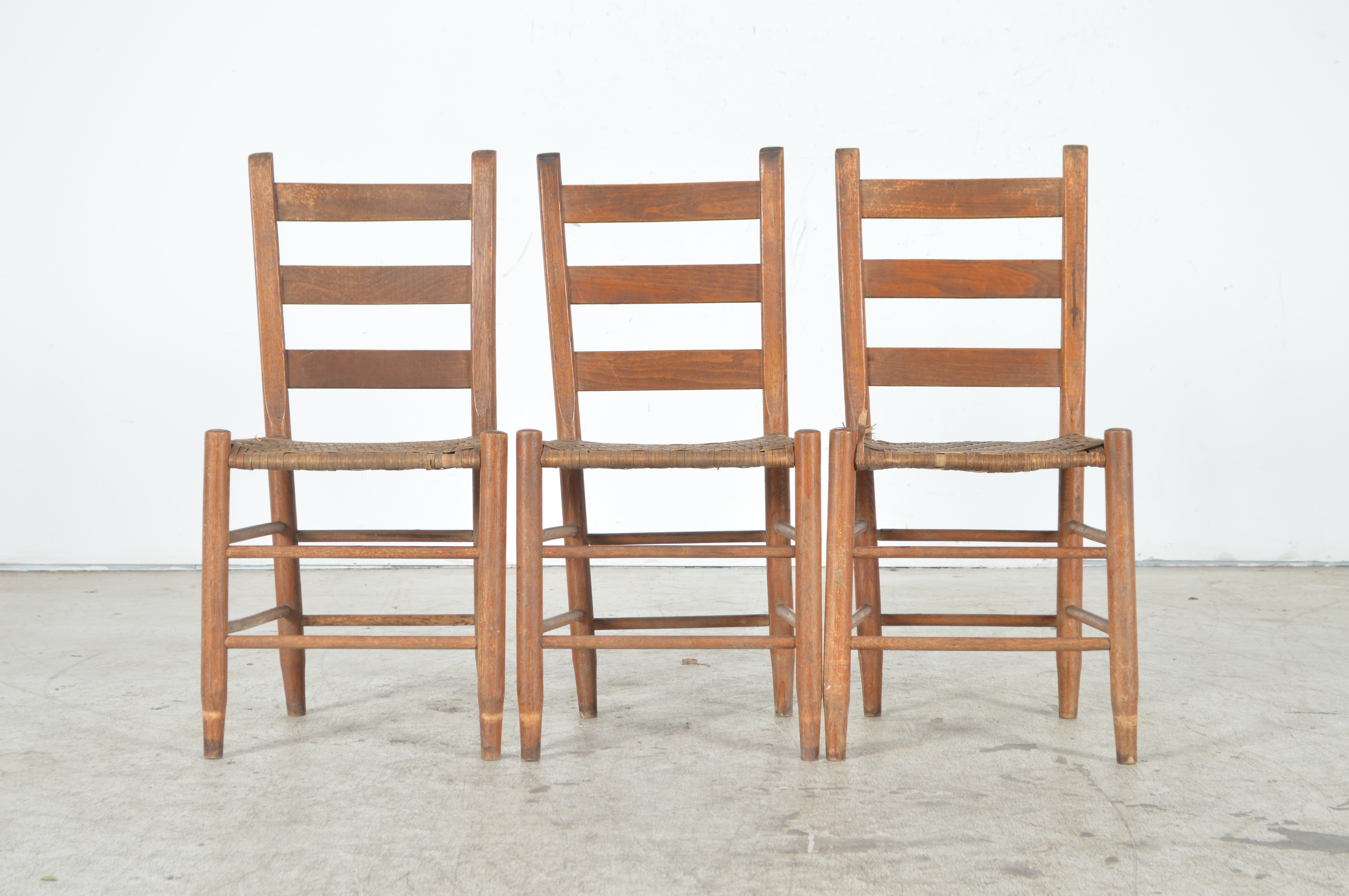 Antique Ladder Back Chairs with Cane Woven Seats