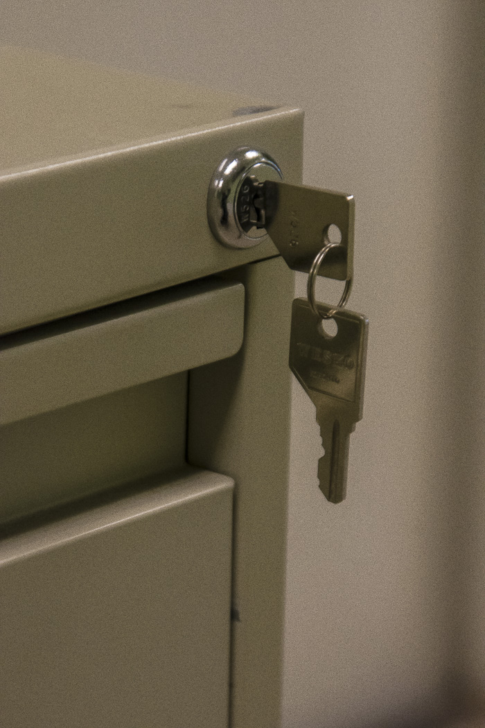 Three Metal Filing Cabinets