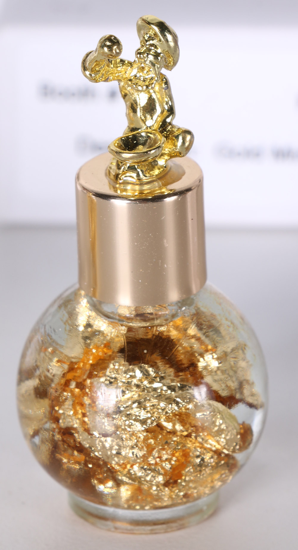 Gold-toned Foil in Decorative Bottles