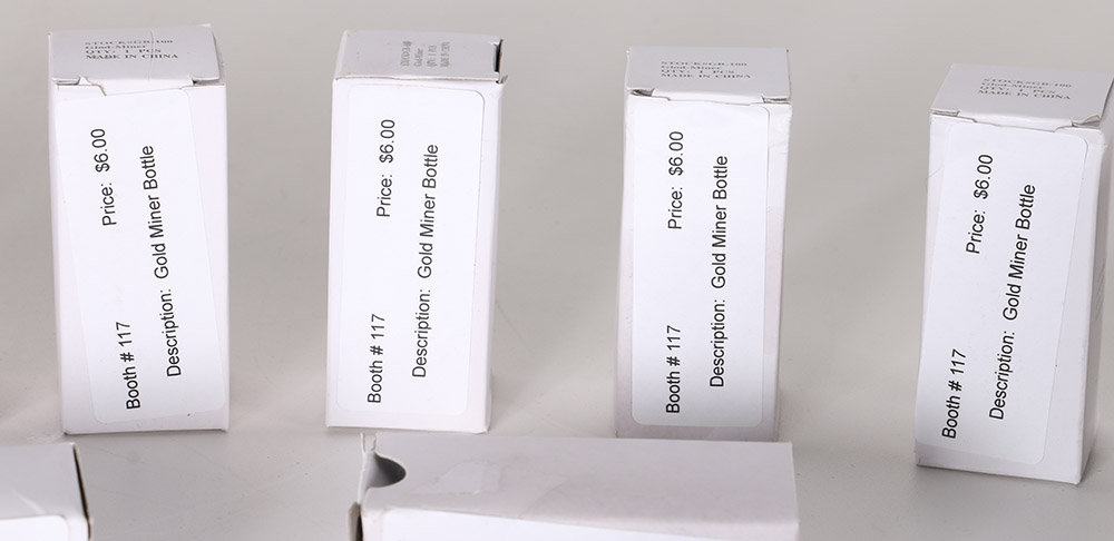 Gold-toned Foil in Decorative Bottles