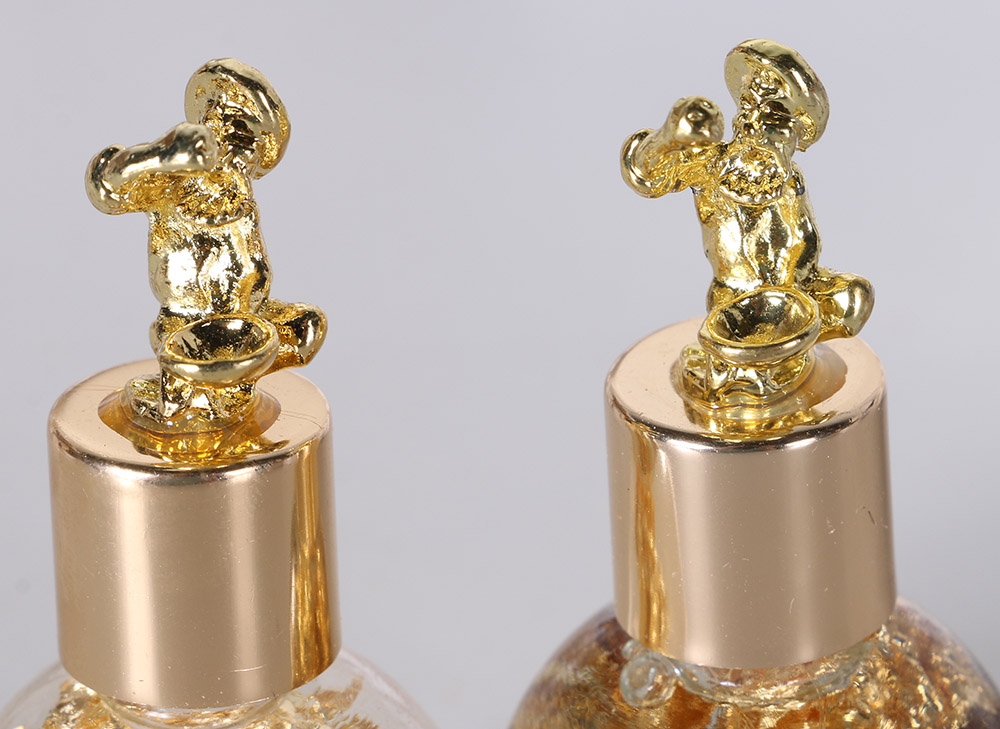 Gold-toned Foil in Decorative Bottles