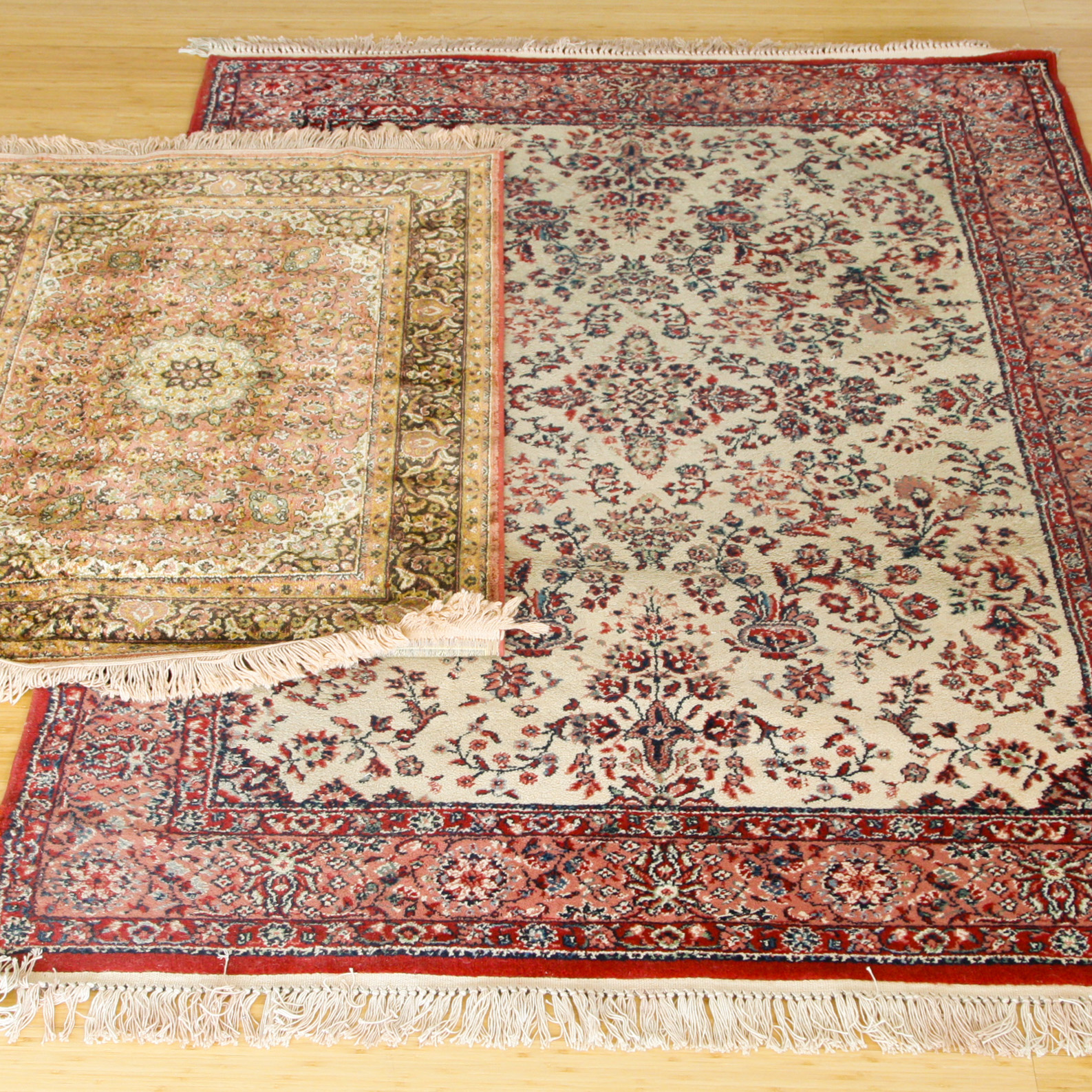 Pair of Machine Woven Floral Accent Rugs