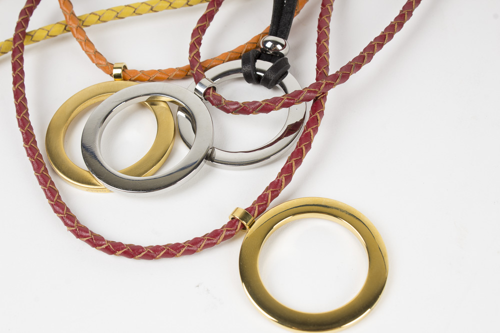 Costume Jewelry Including Braided Leather Necklaces