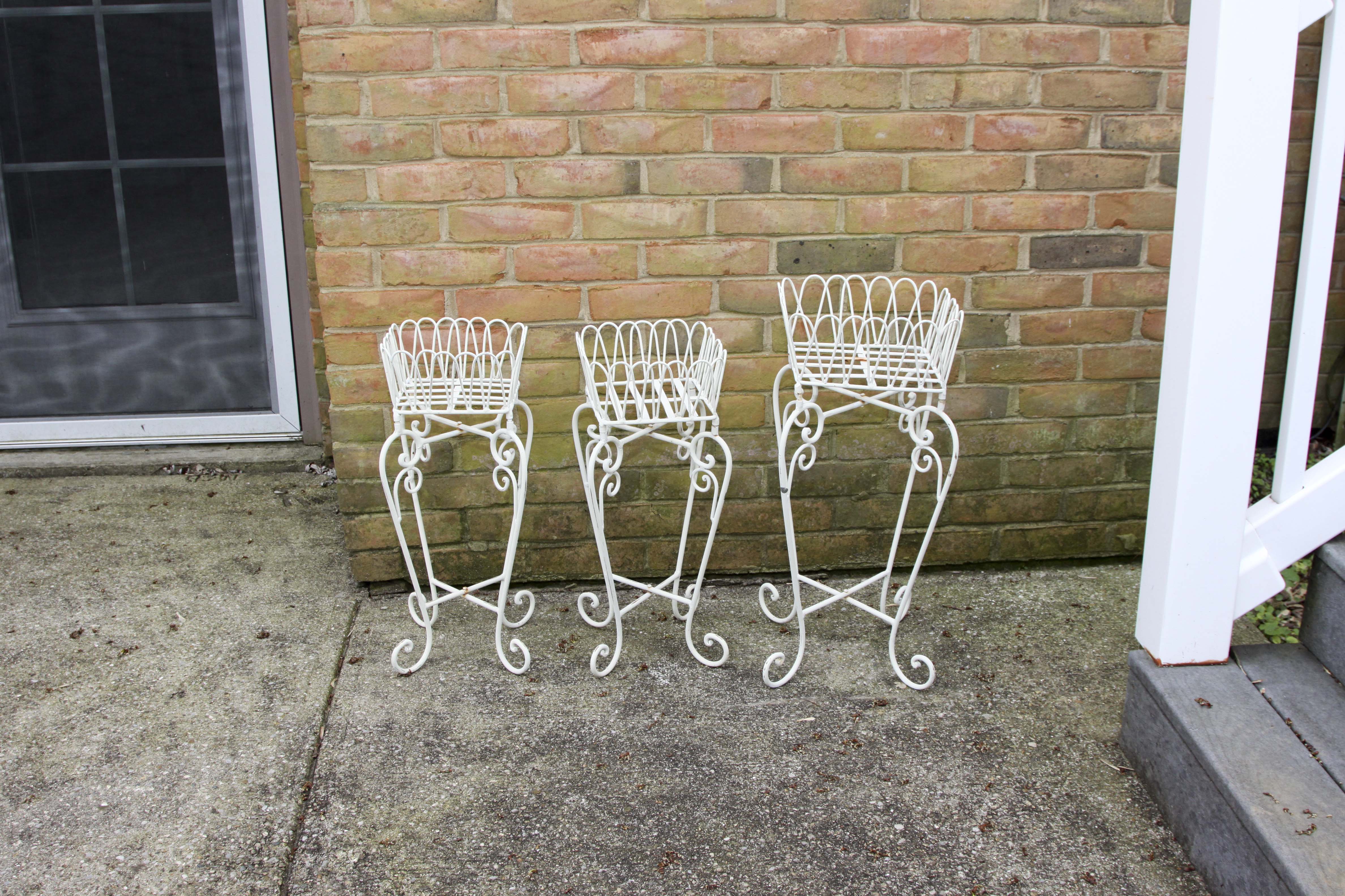 A Set of Off White Plant Stands.