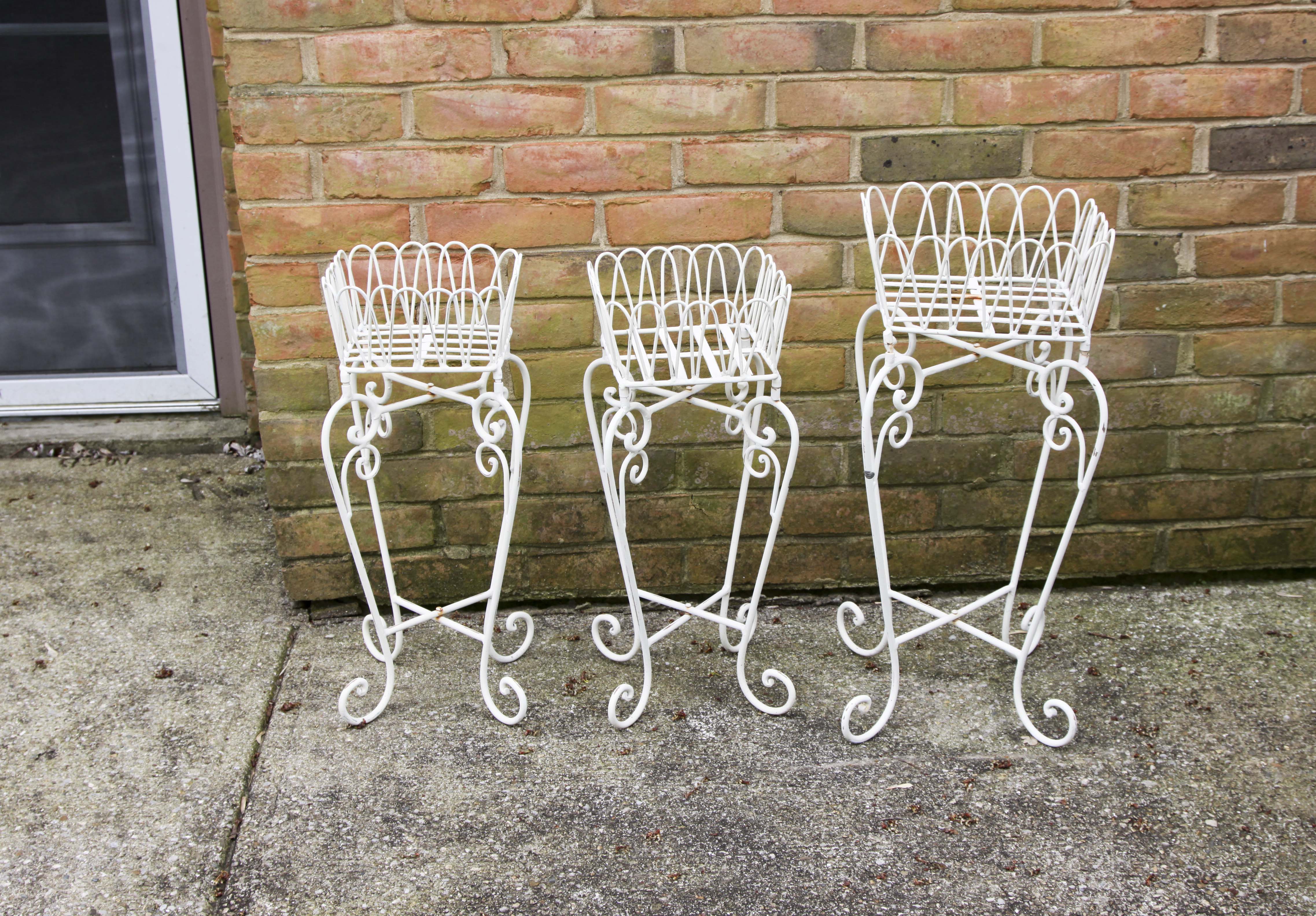 A Set of Off White Plant Stands.